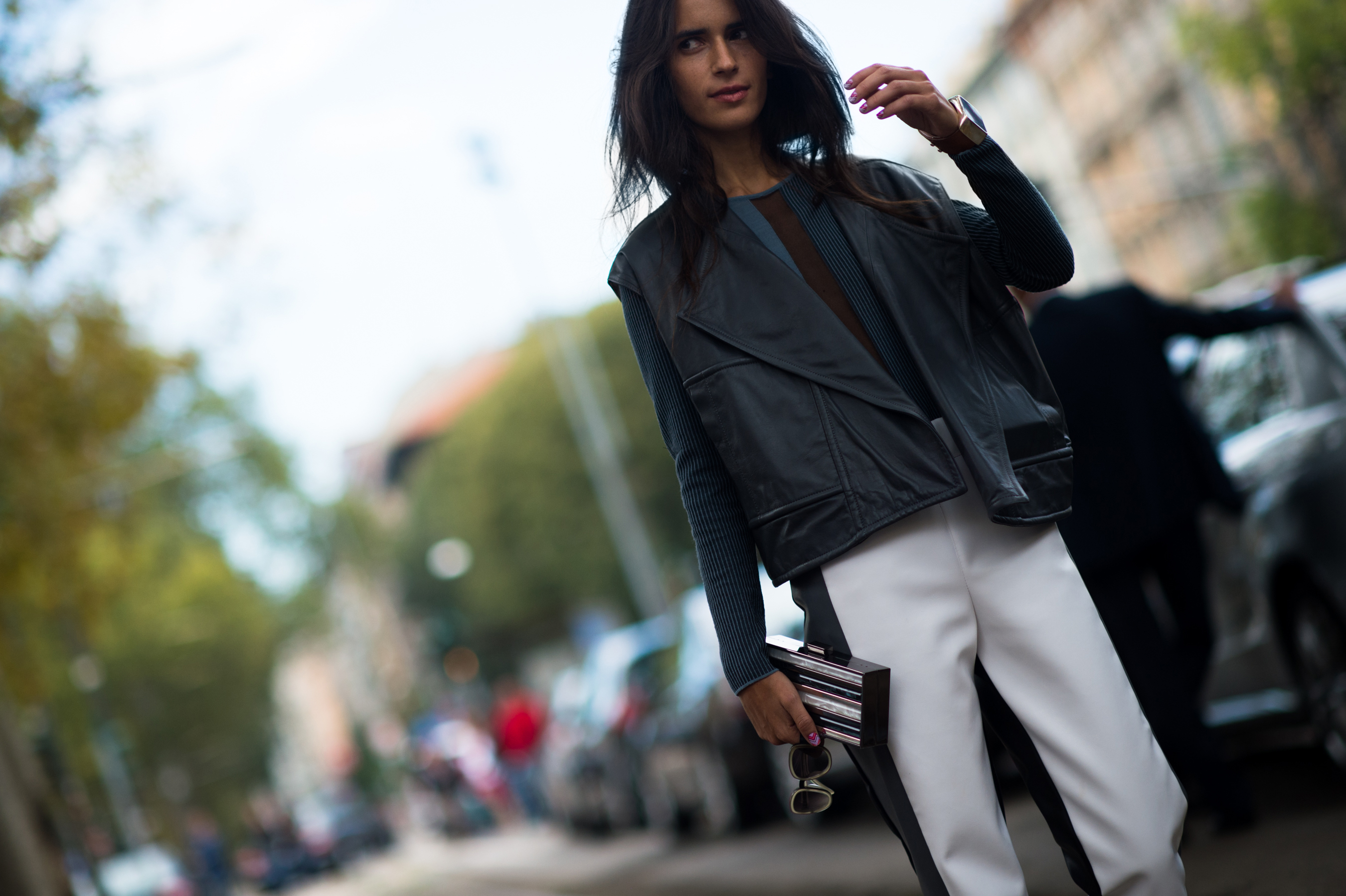 Italian woman wearing leather vest