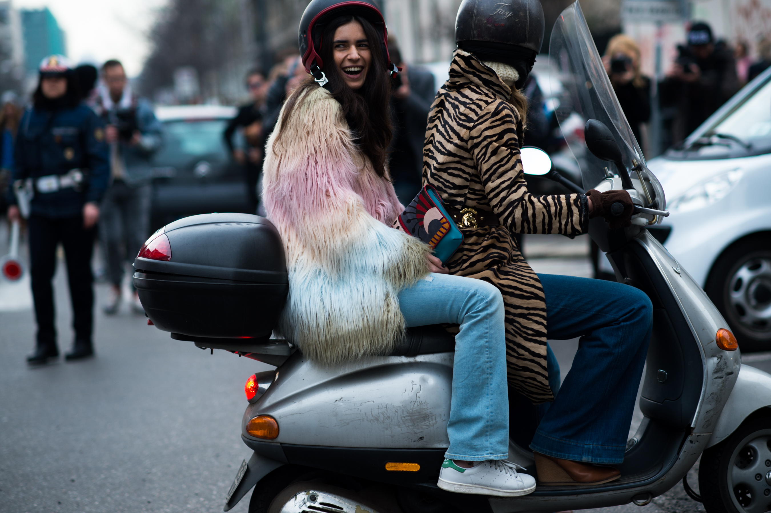 Two Italian women on scooter after the show
