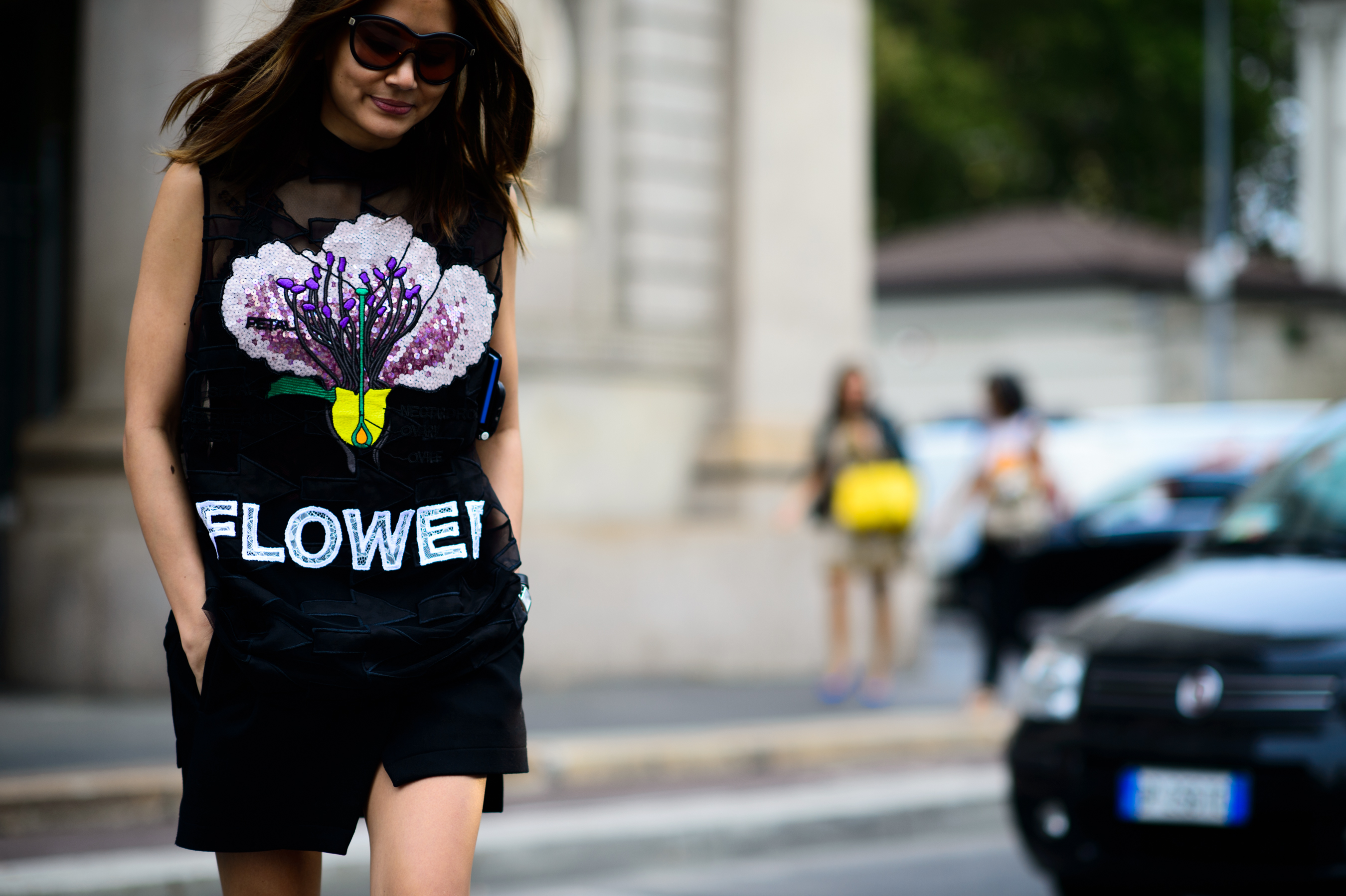 Vogue Australia editor wearing dress with flower embroidery
