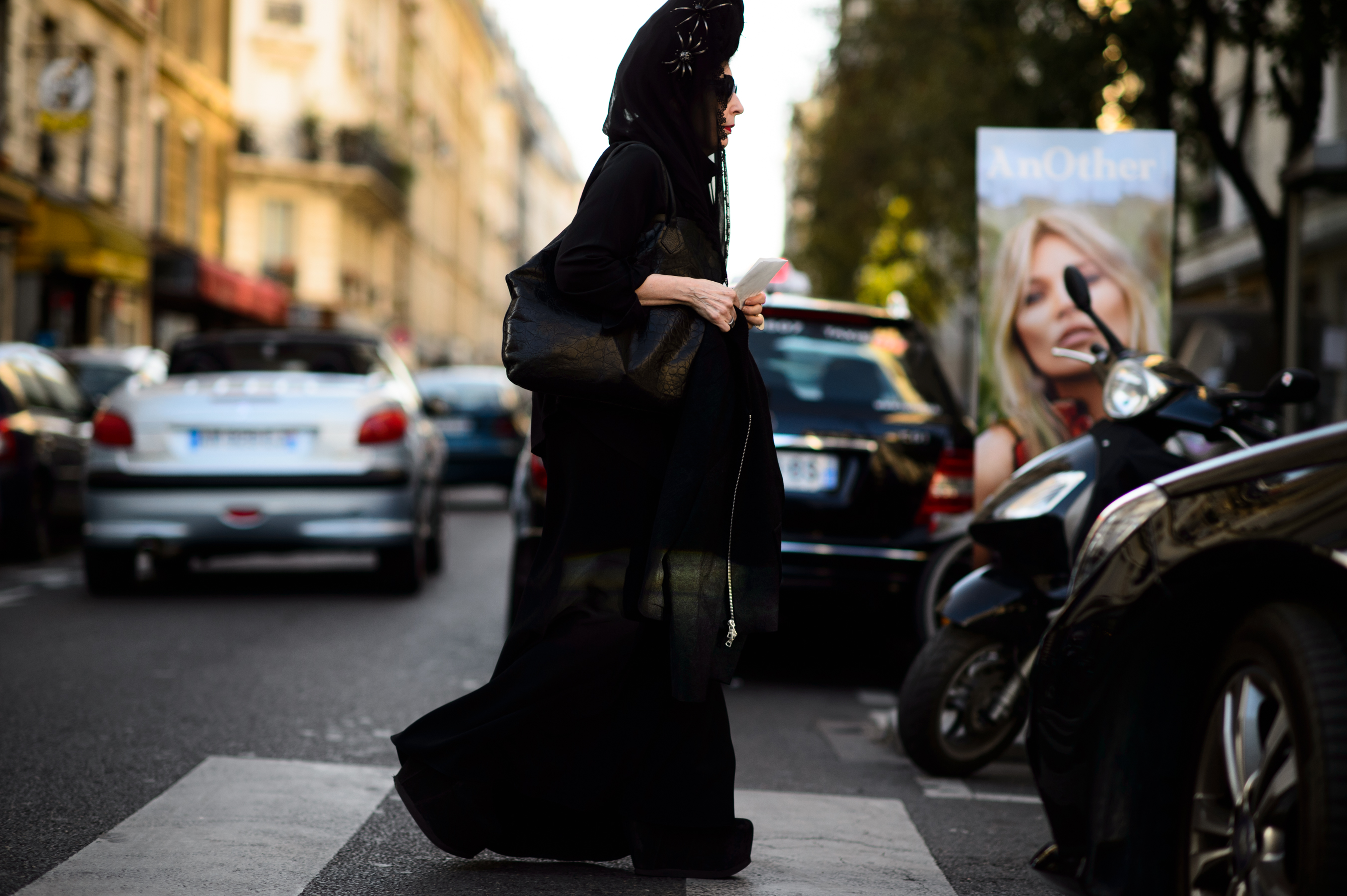 Woman wearing eccentric outfit with spiders
