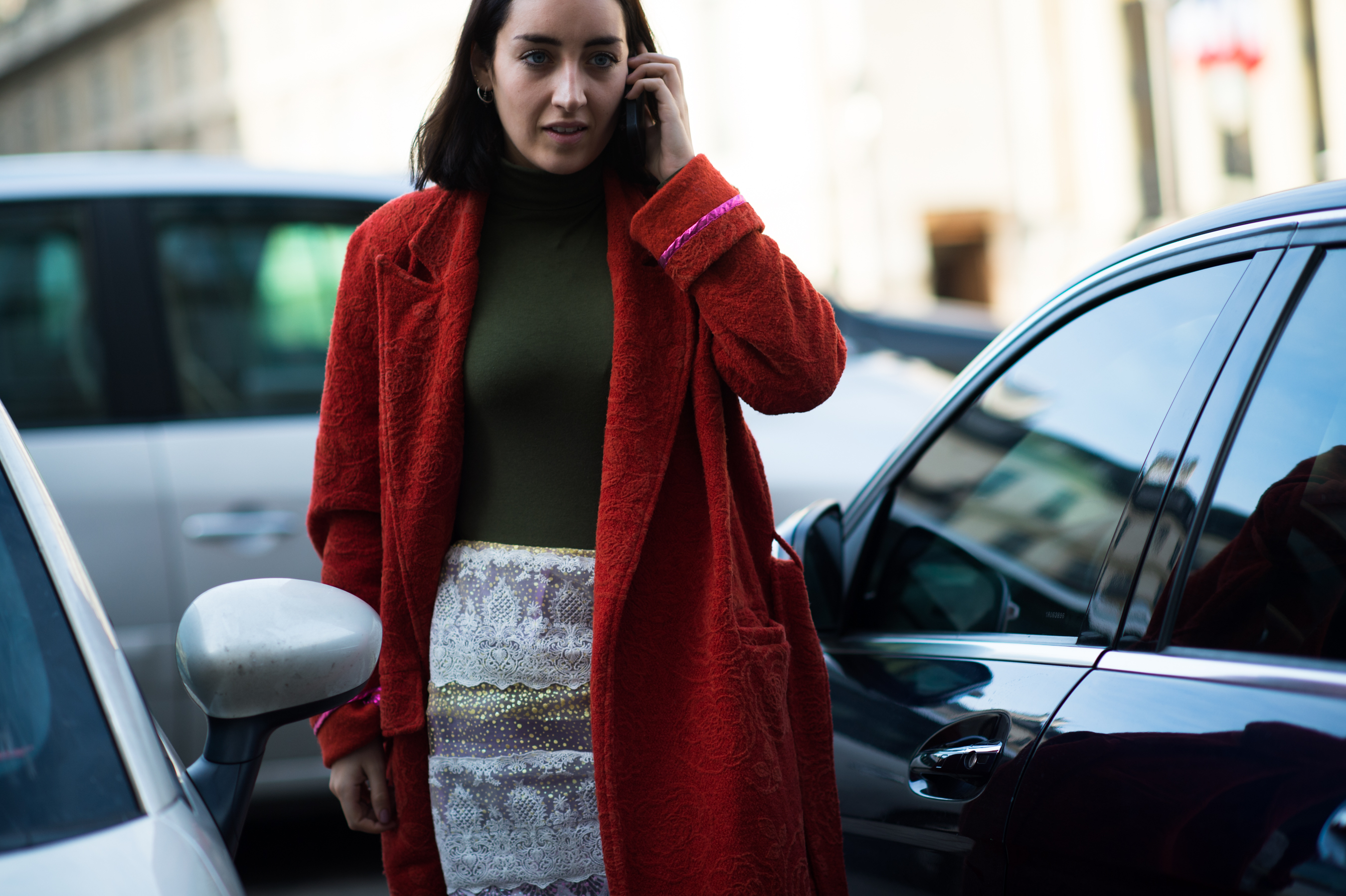 British editor wearing red coat