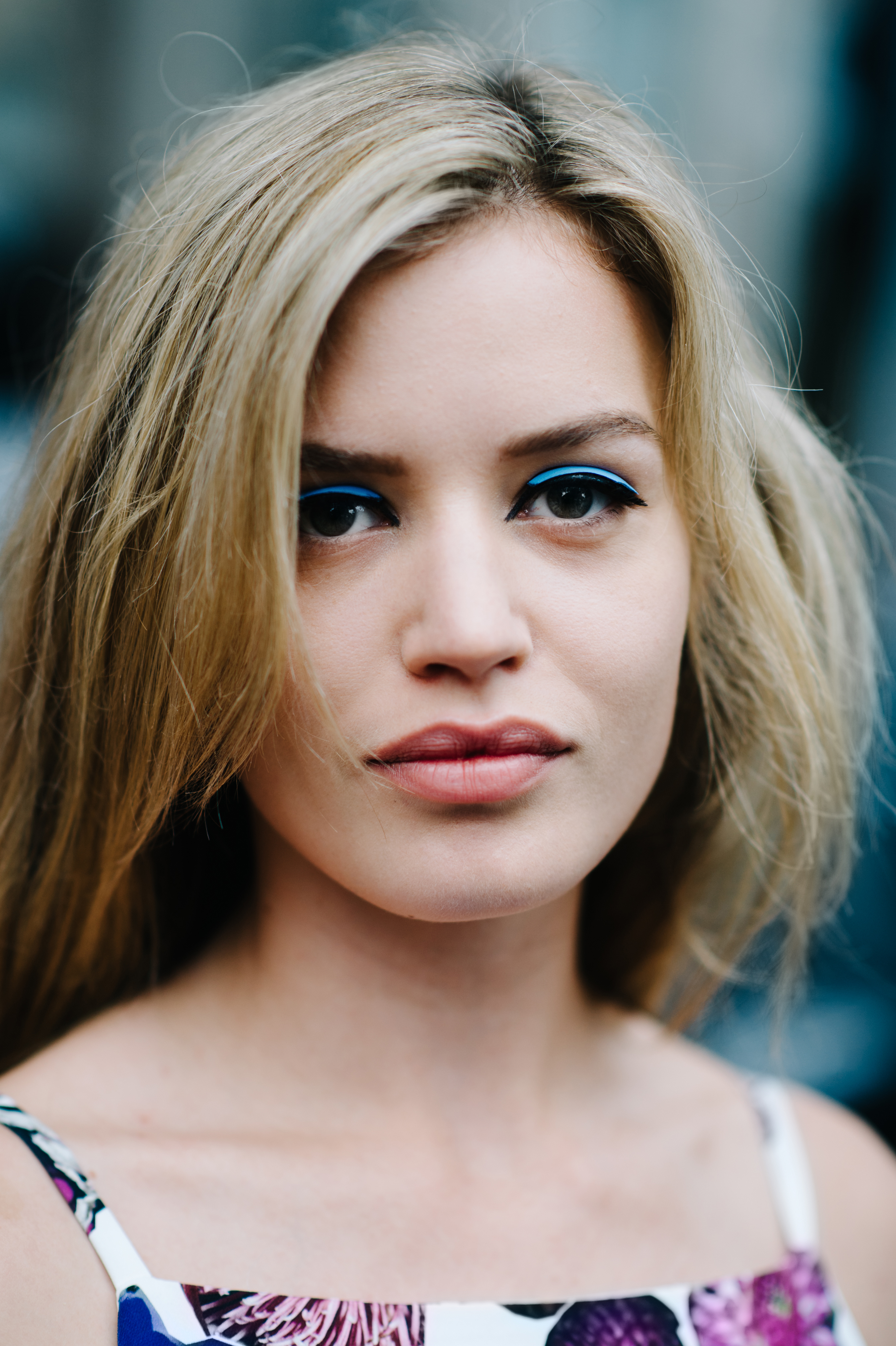 Portrait of English fashion model wearing blue make up