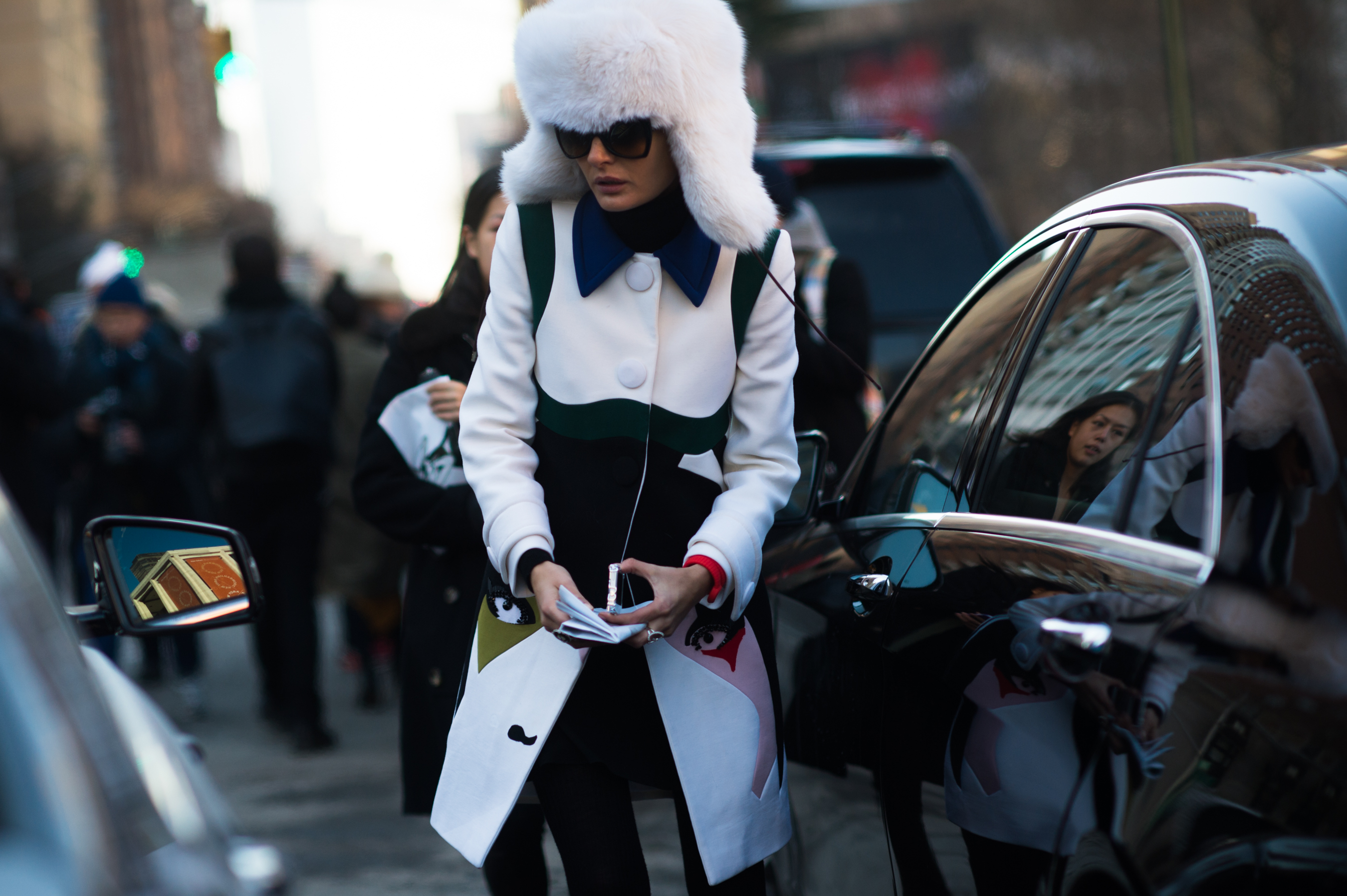 Italian woman wearing big fur hat