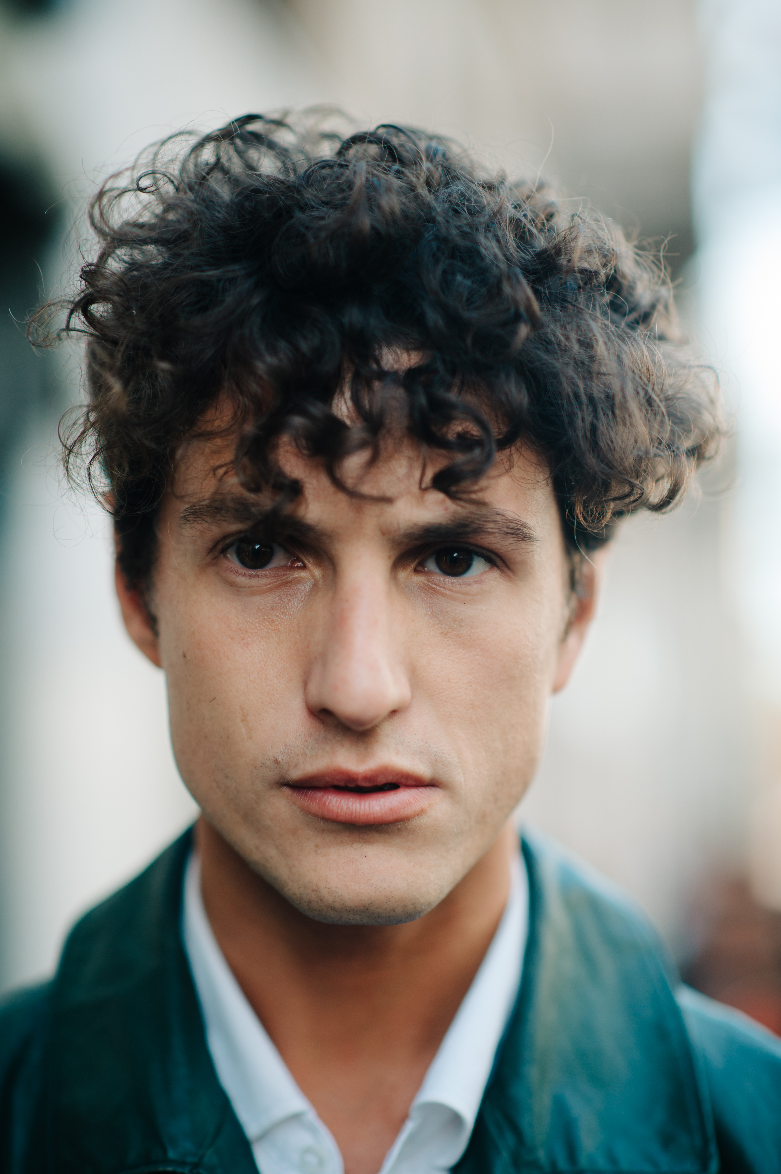 Portrait of Italian man with curly hair