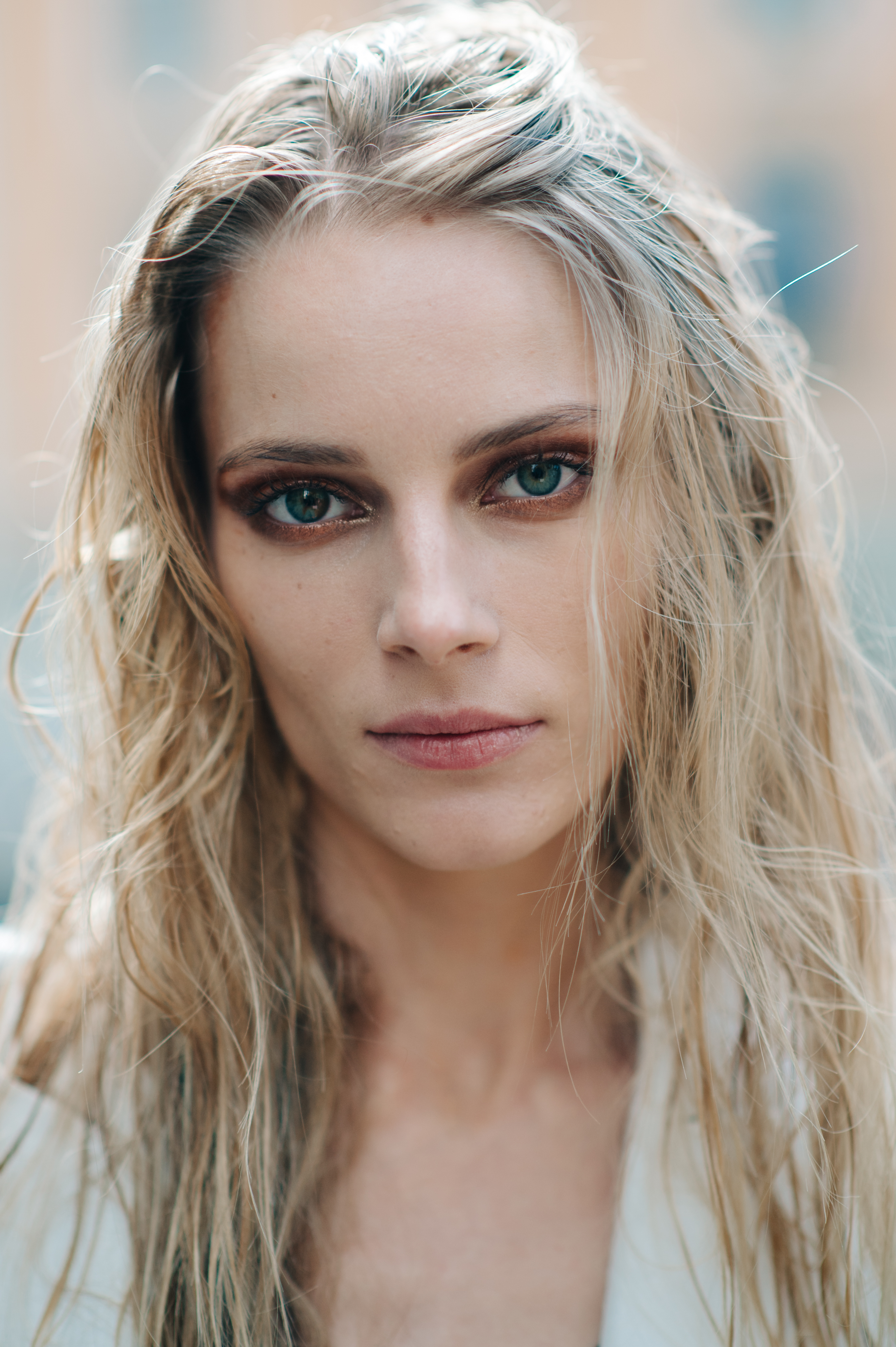 Portrait of a blonde model with green eyes