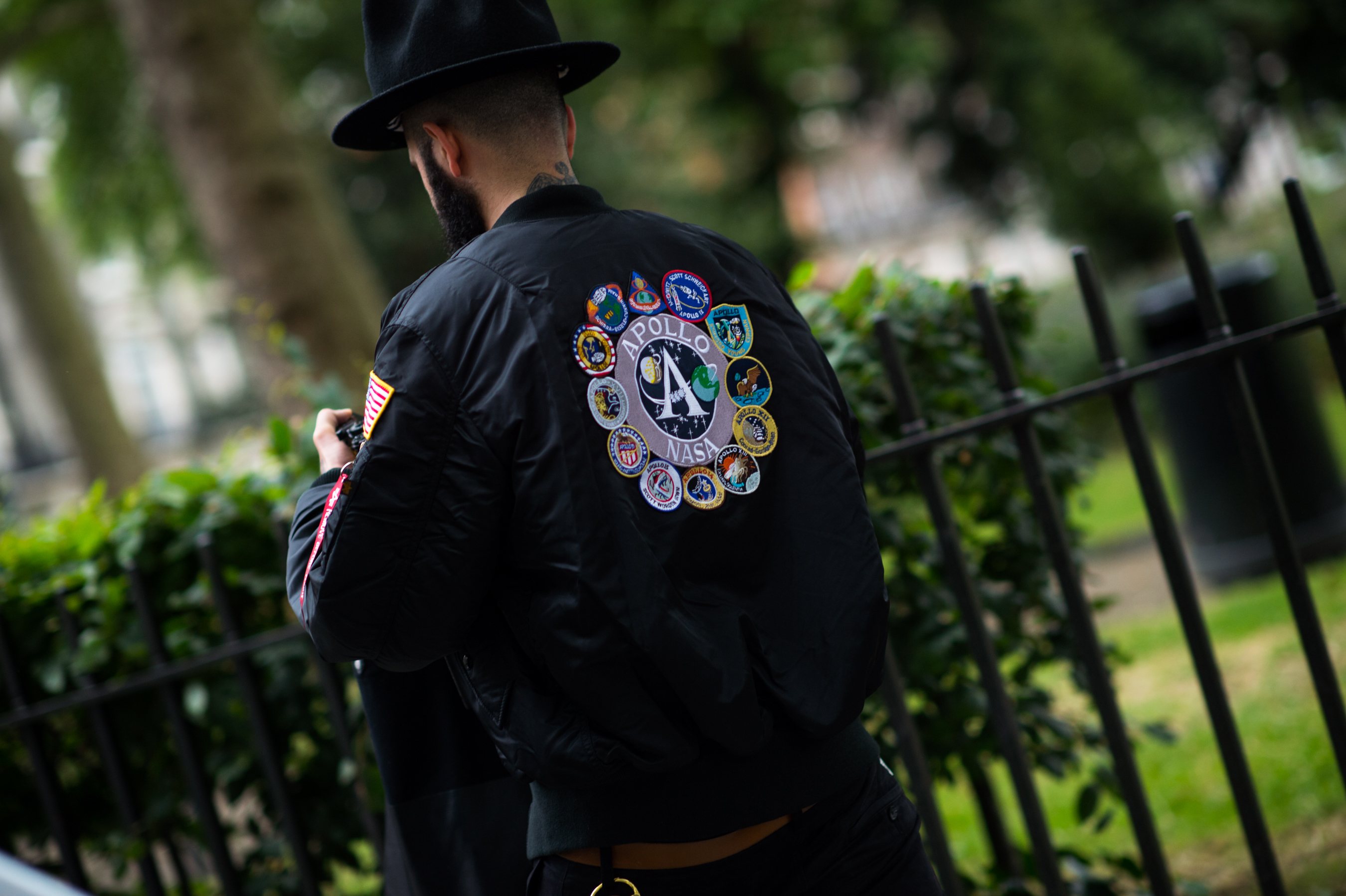 Man wearing Apollo Nasa patch on a back
