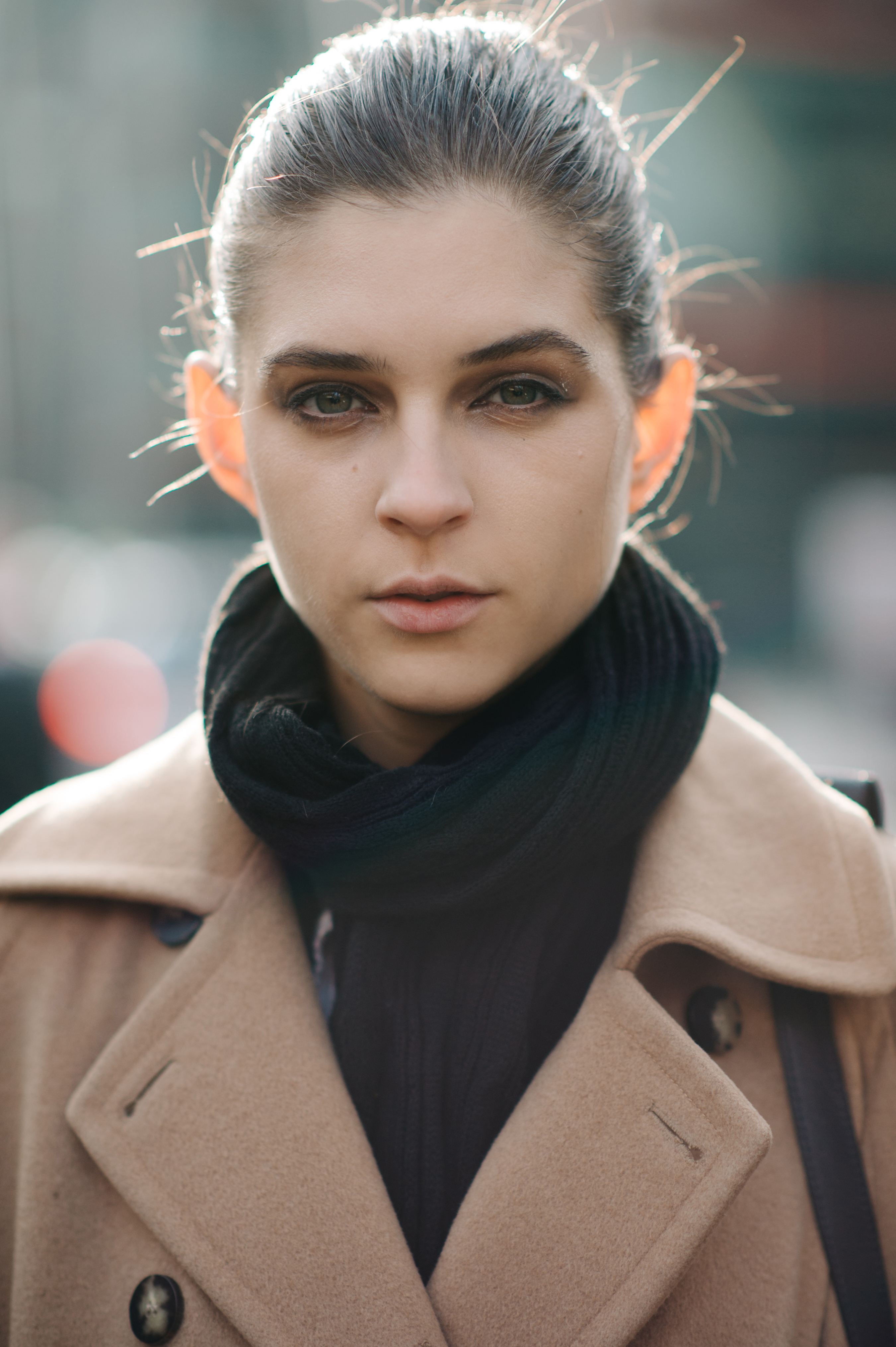 Portrait of a girl wearing beige coat