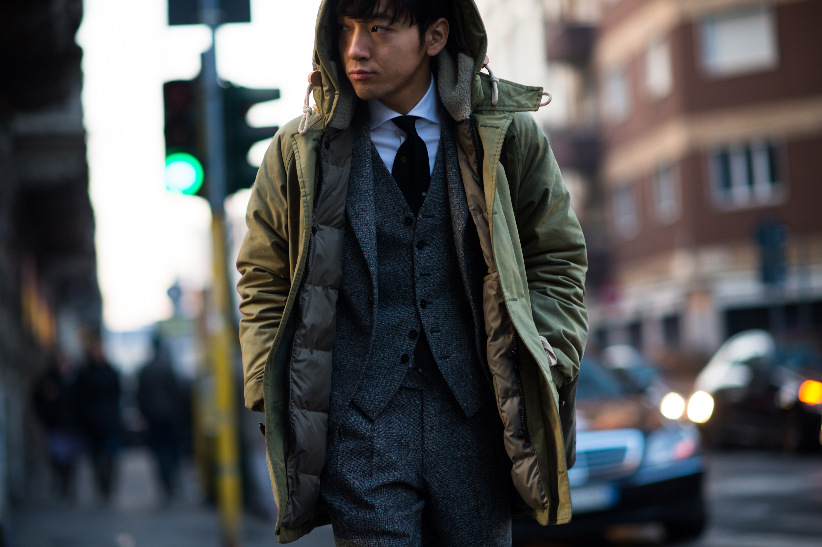 Japanese man wearing green parka