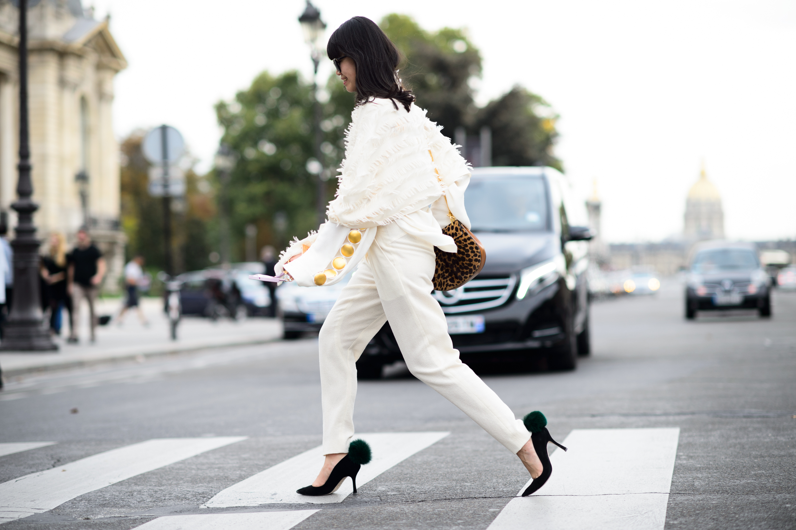 Blogger wearing shoes with fur balls