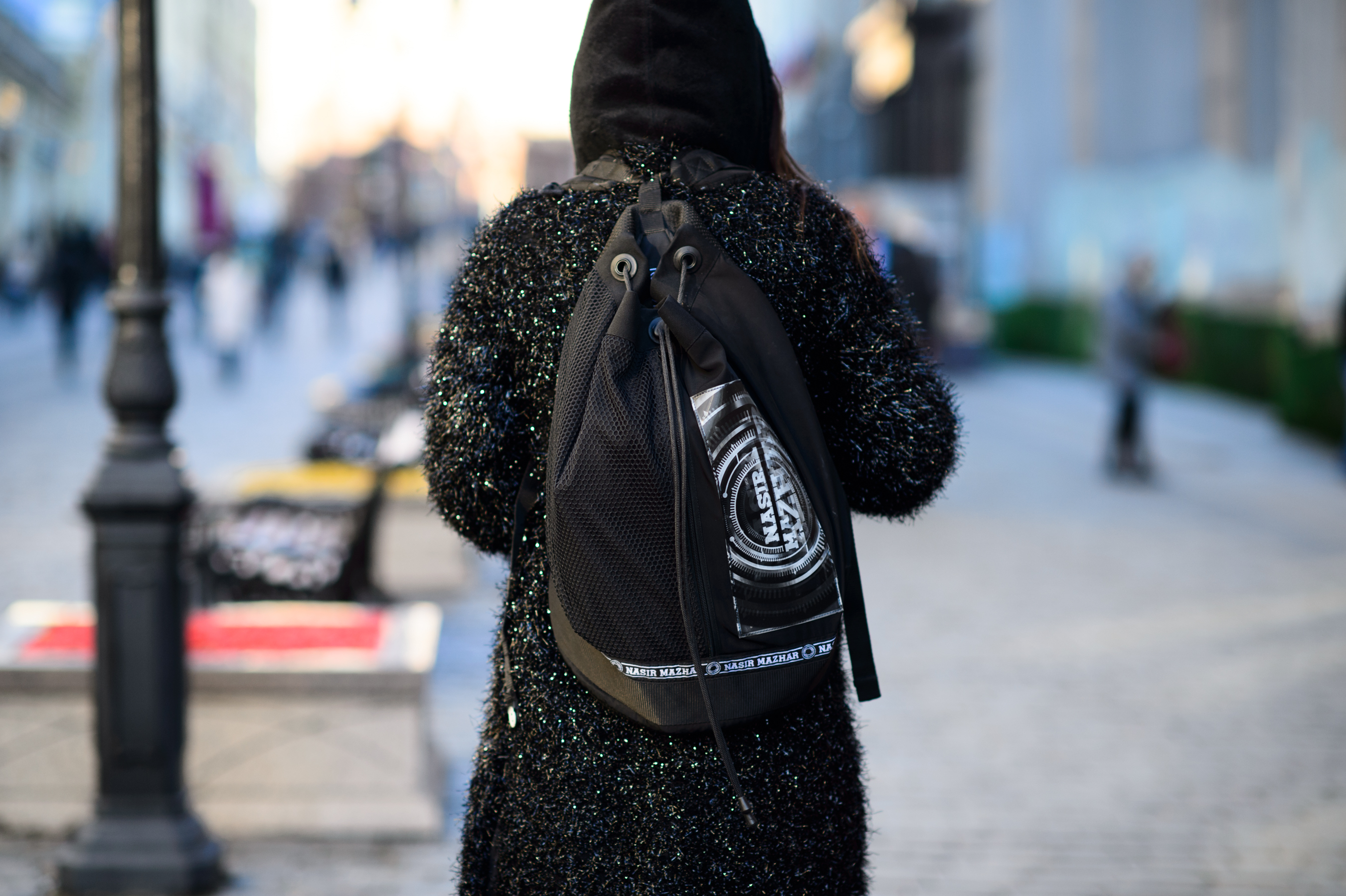 KM20 buyer wearing Nasir Mazhar backpack
