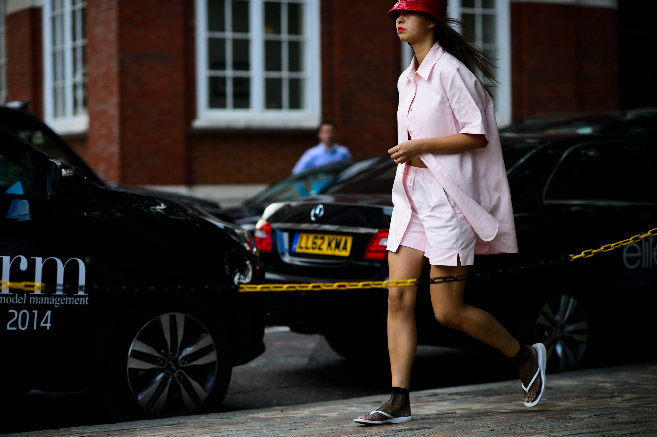 KM20 buyer wearing pink cotton outfit