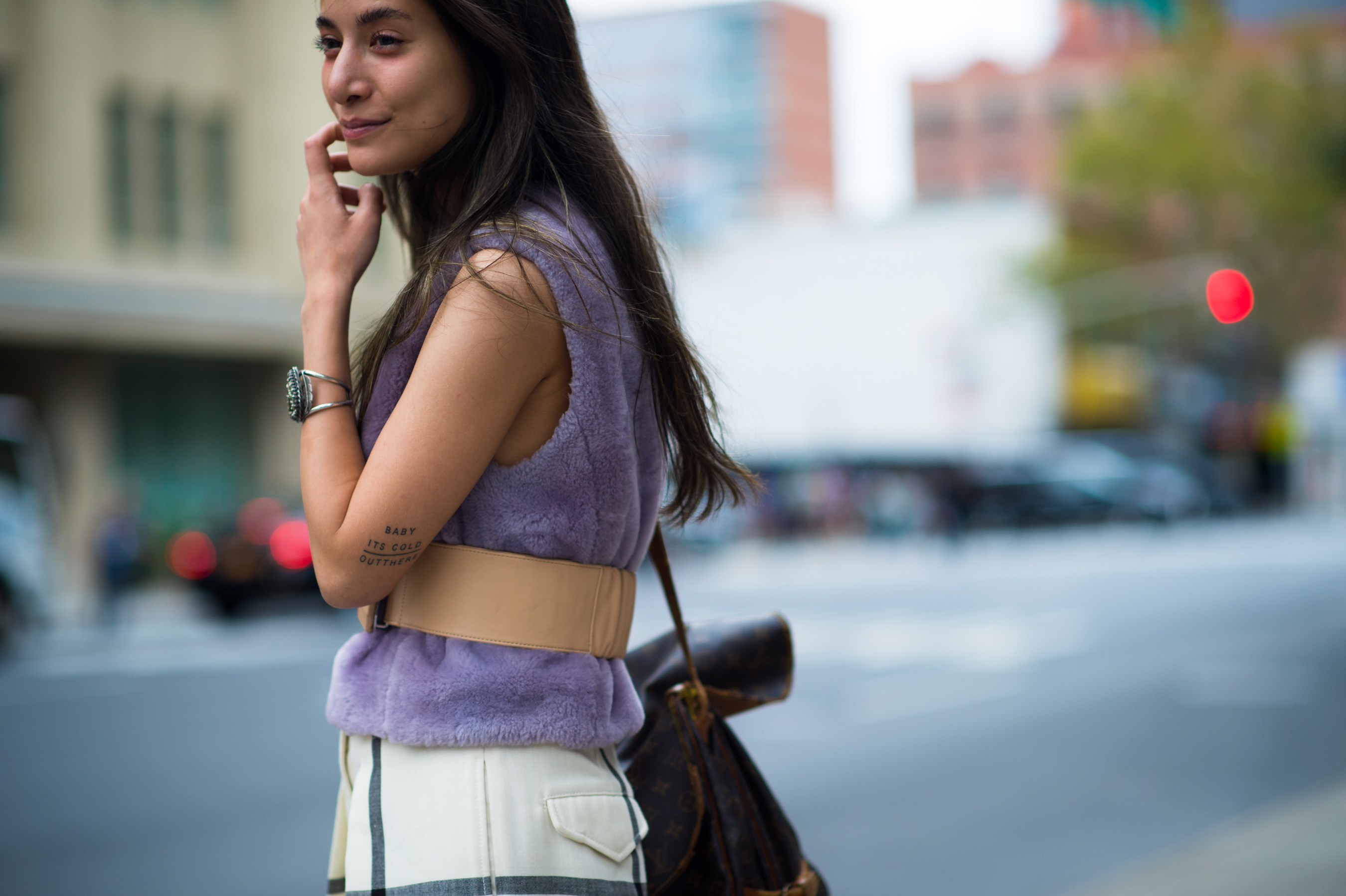 Girl with Baby Its Cold tattoo and plush top
