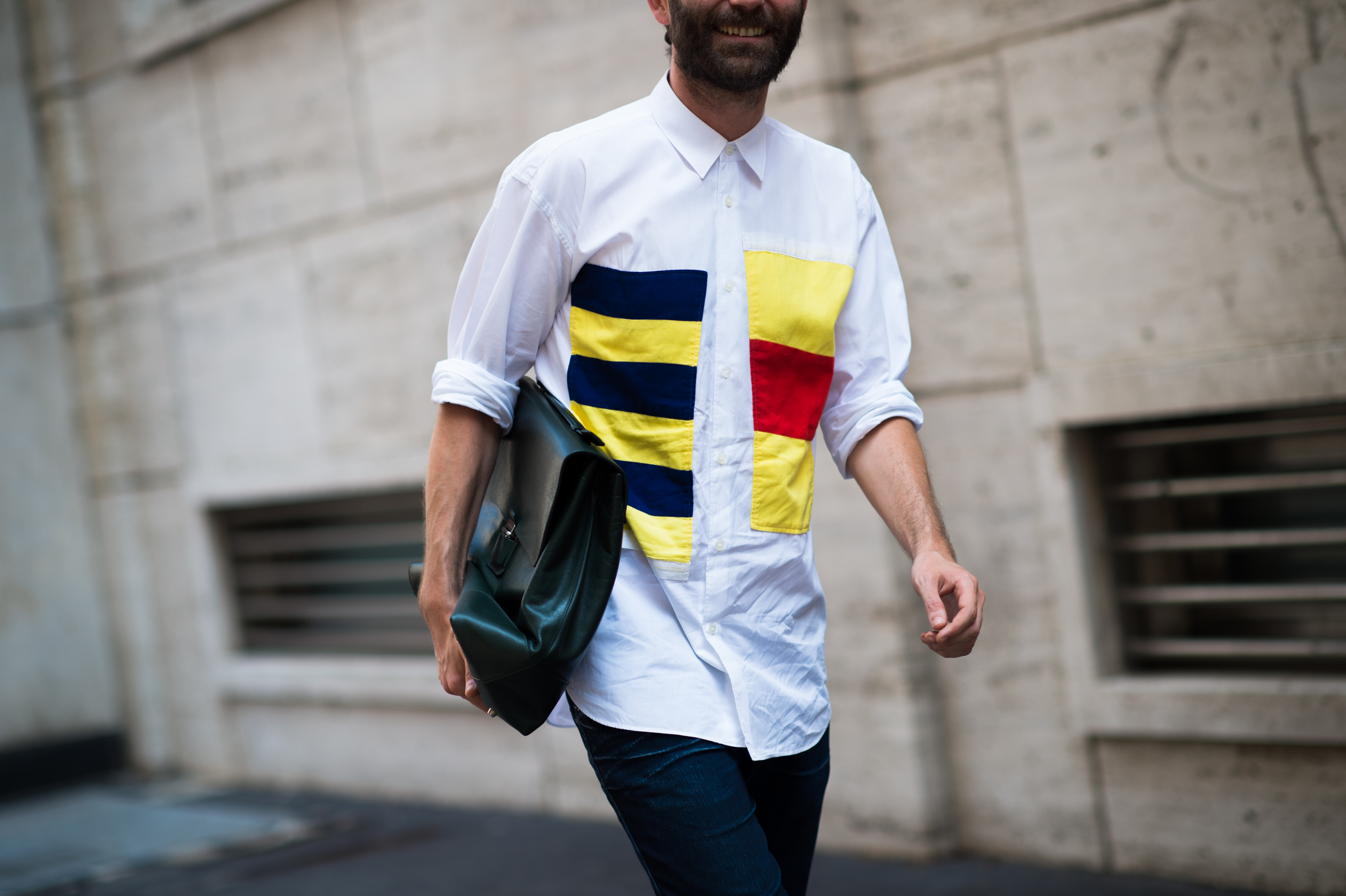 Man wearing shirt with colour patches