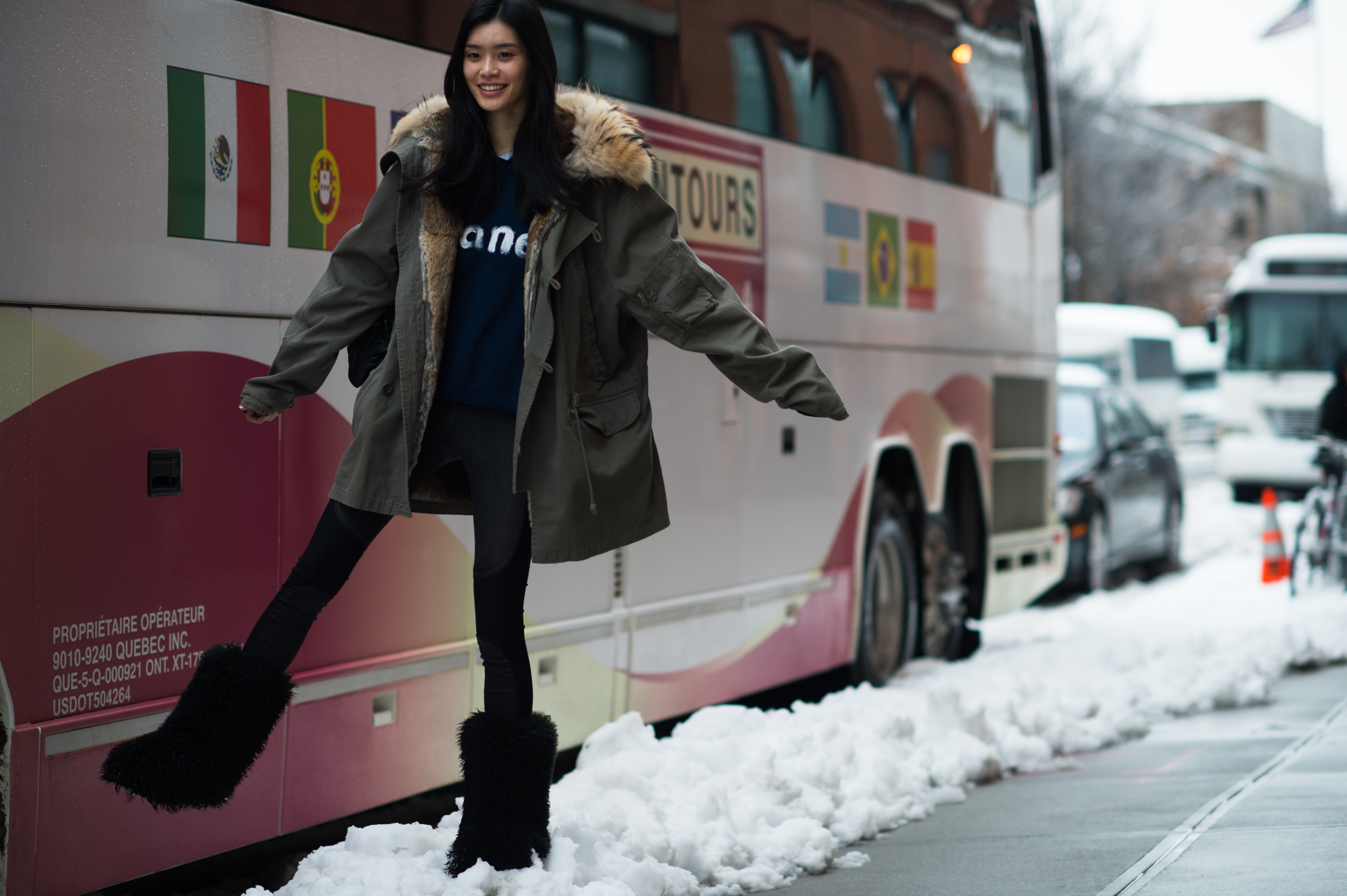 Chinese model wearing parka and furry boots