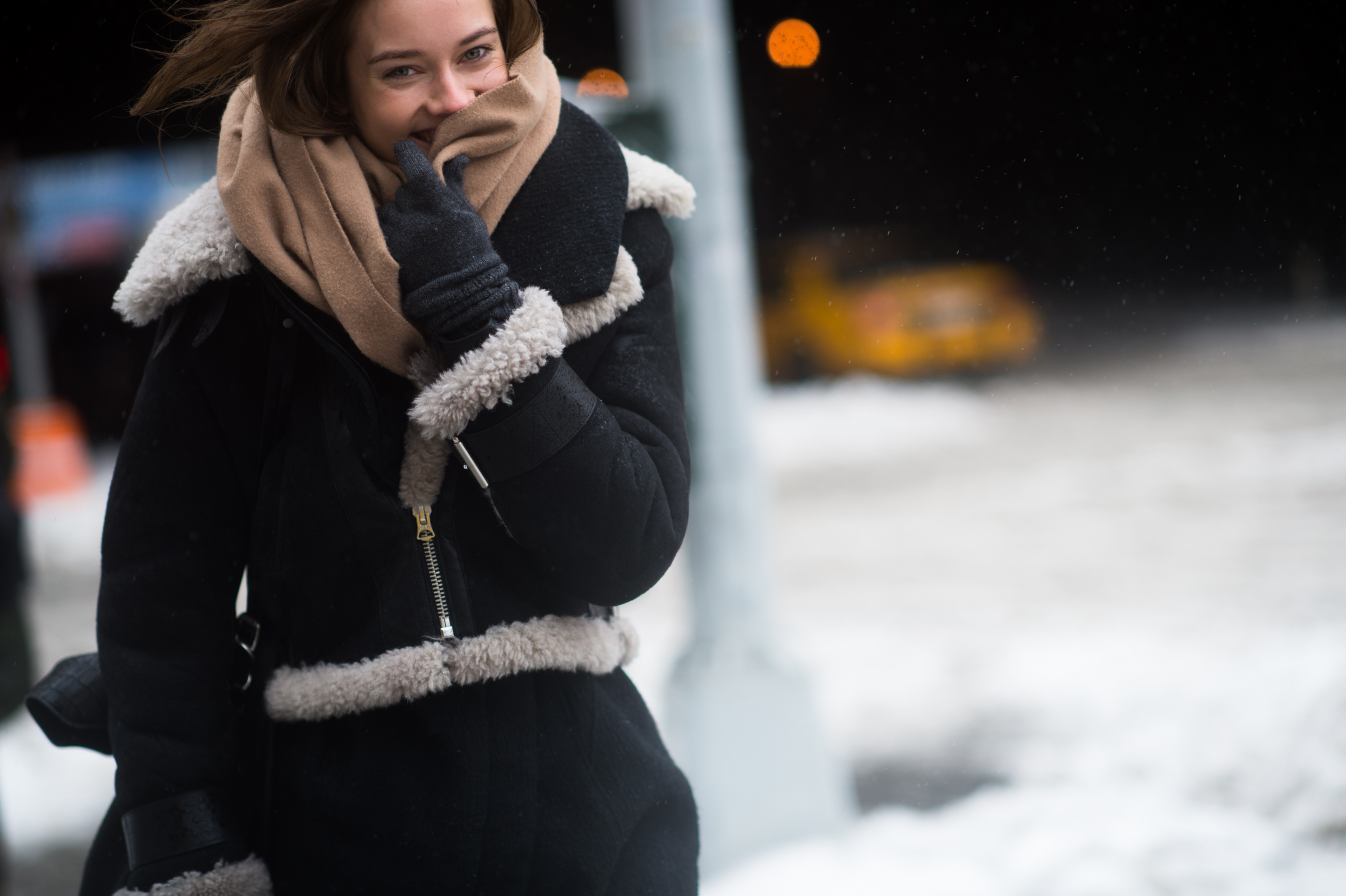 Woman wearing beige scarf