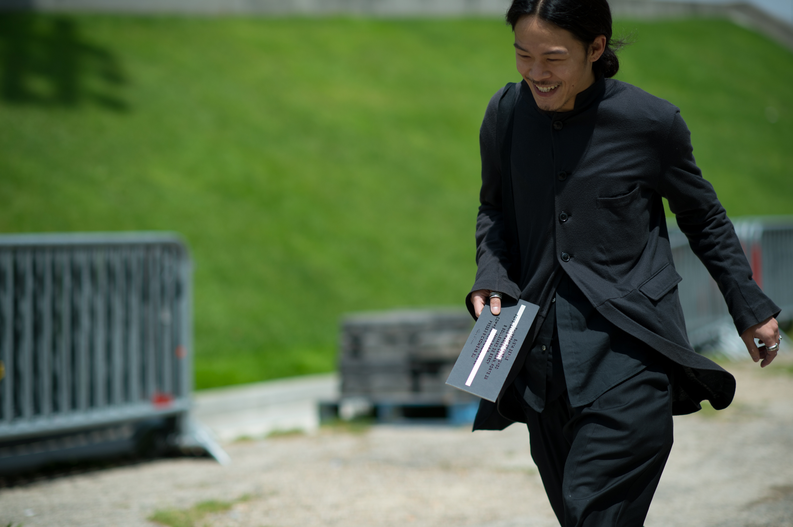 Asian man wearing black