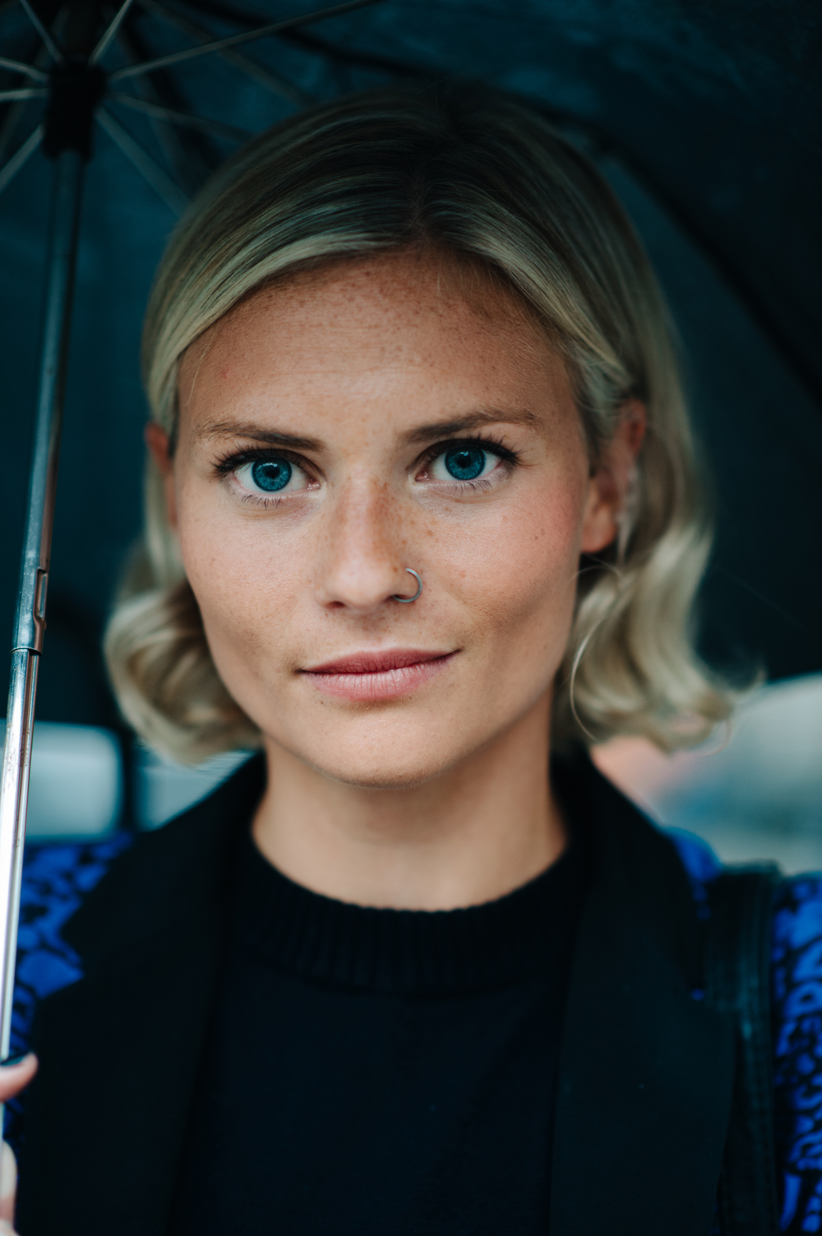 Portrait of a blonde British woman with nose ring