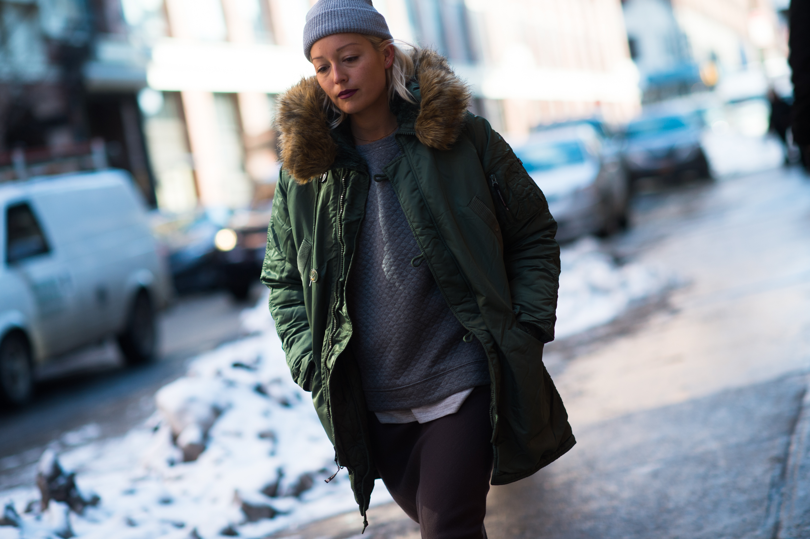 Editor wearing green winter coat
