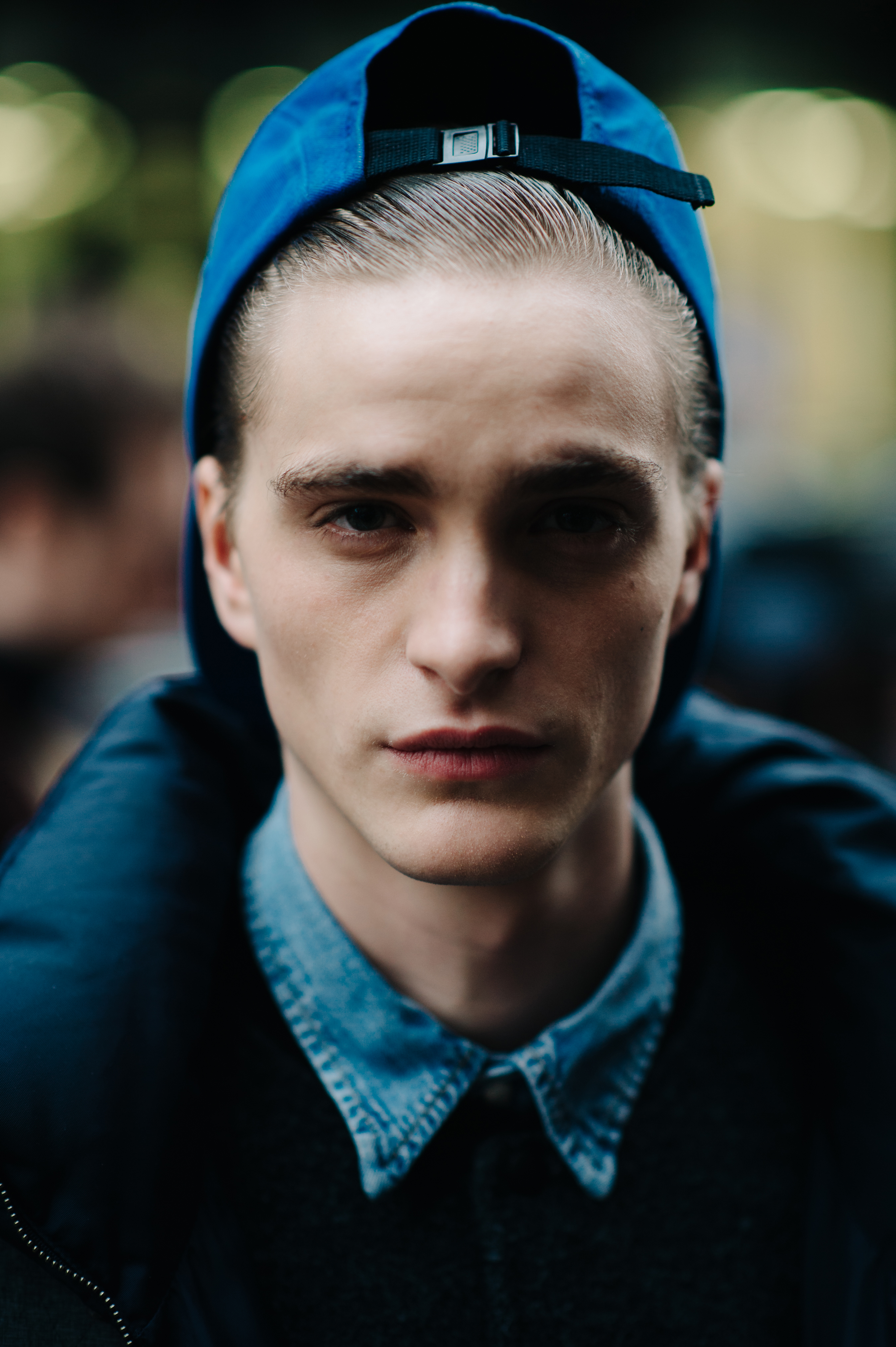 Portrait of a male model wearing blue hat