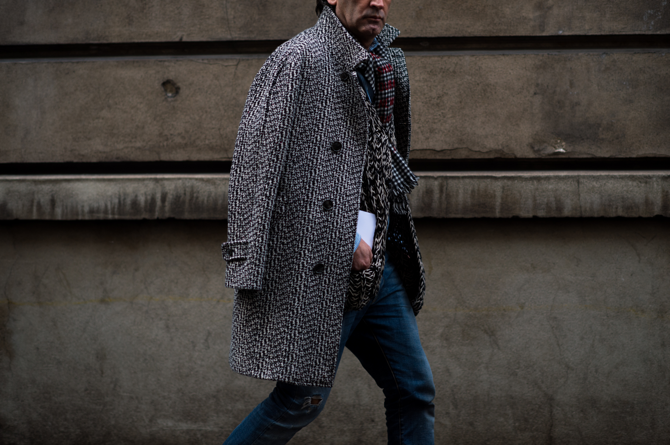 Man waring monochrome coat