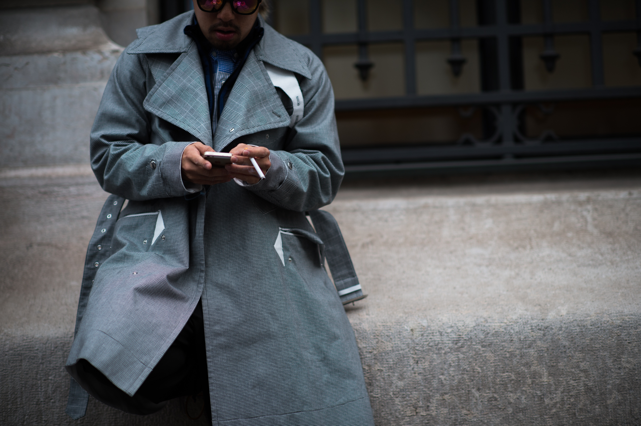 Man wearing gray coat