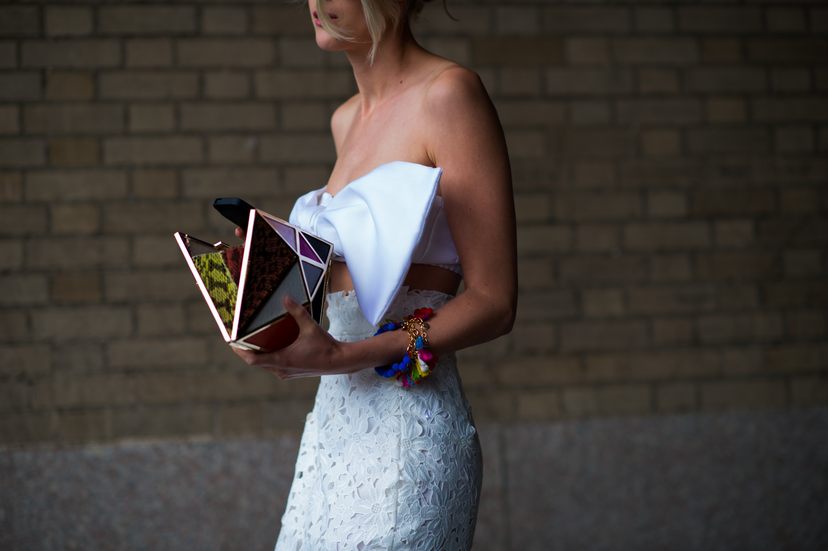 Blogger wearing white bow shaped top