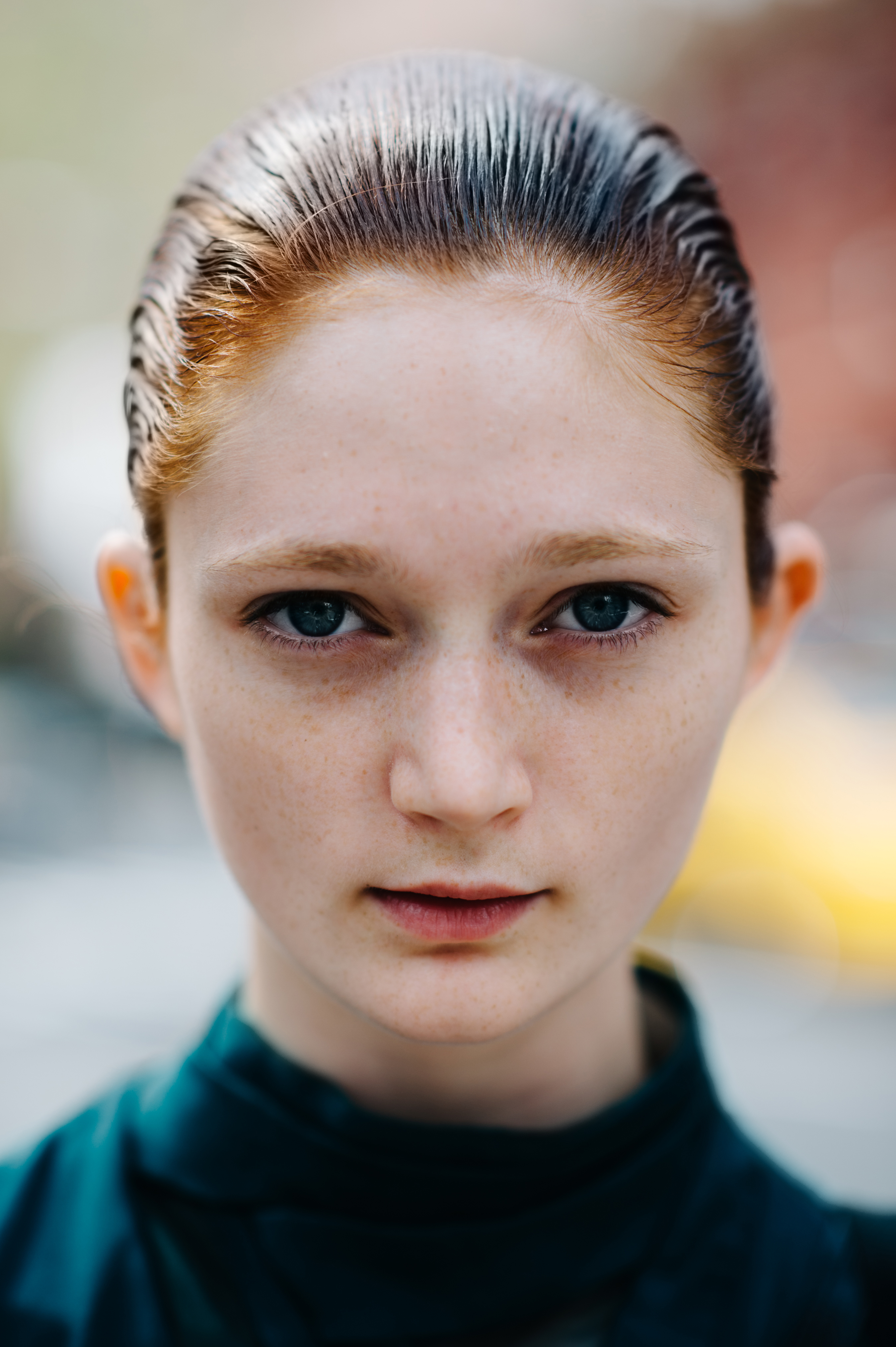 Portrait of a model with red hair and green eyes