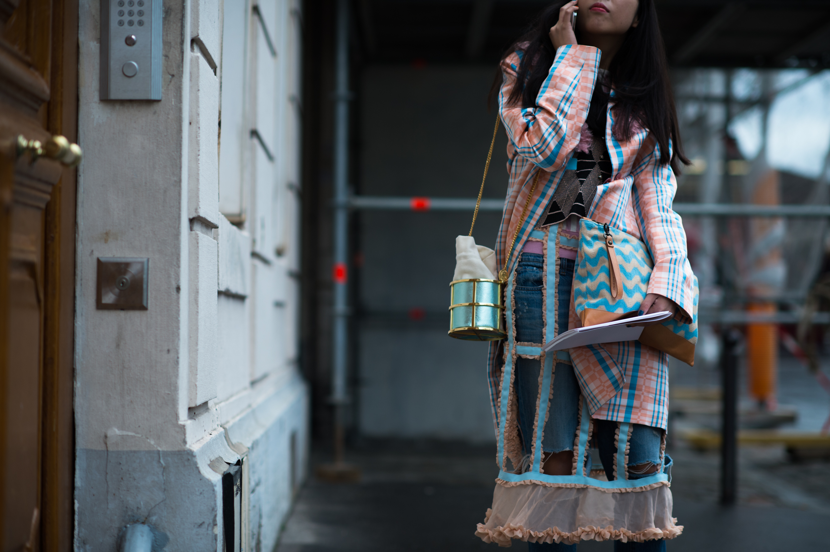 British fashion journalist with two bags
