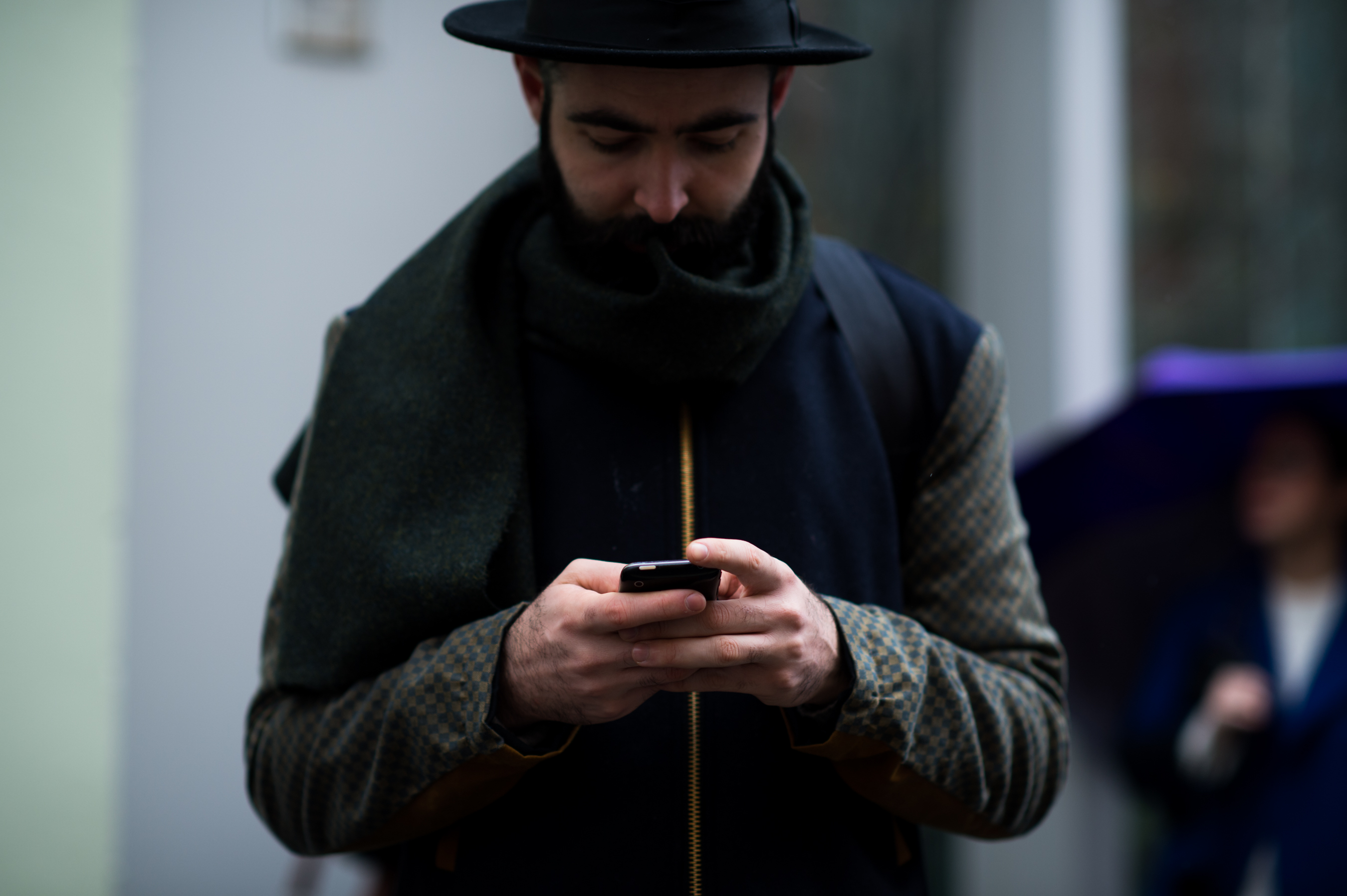 Man wearing scarf and hat