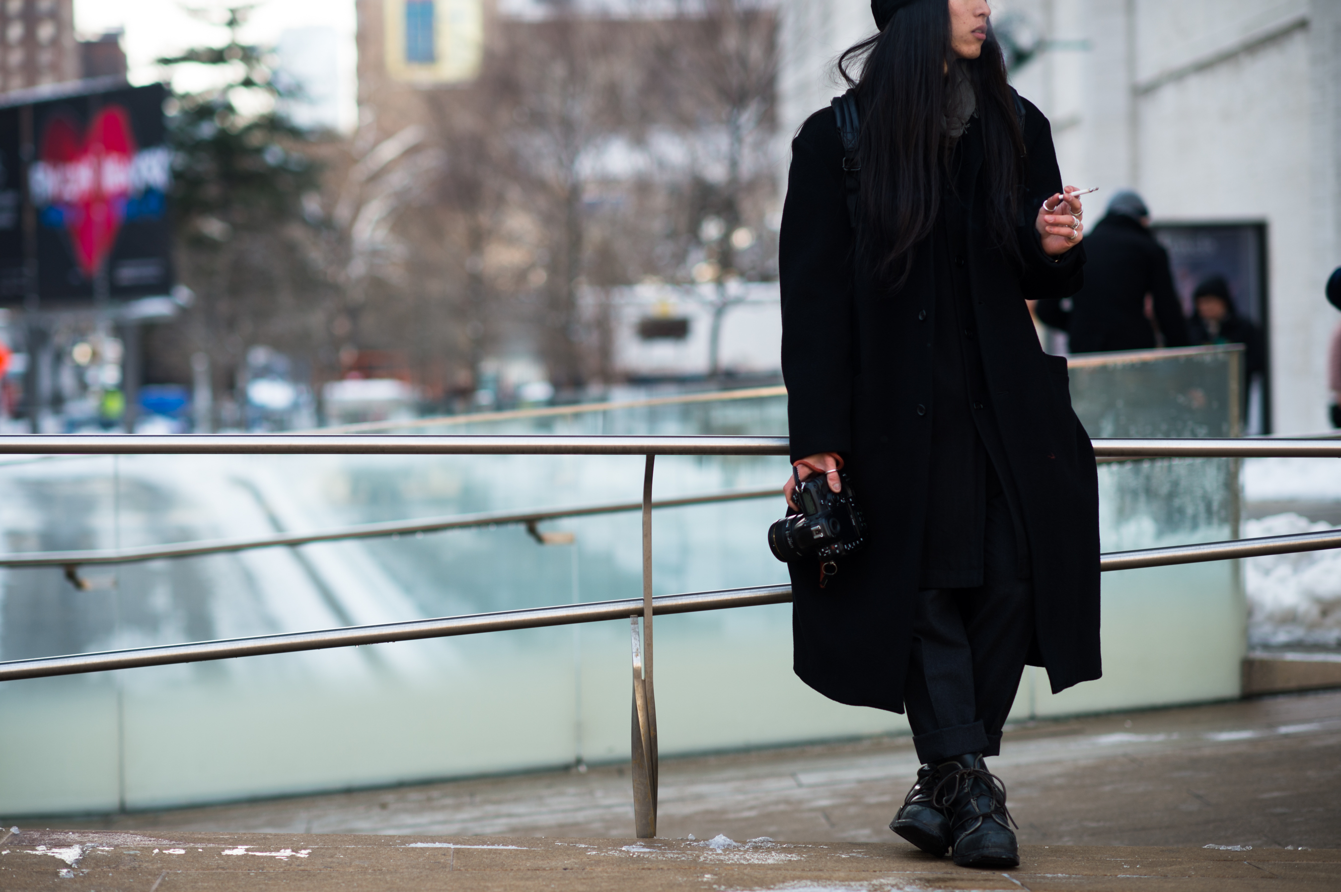 Photographer with long black hair