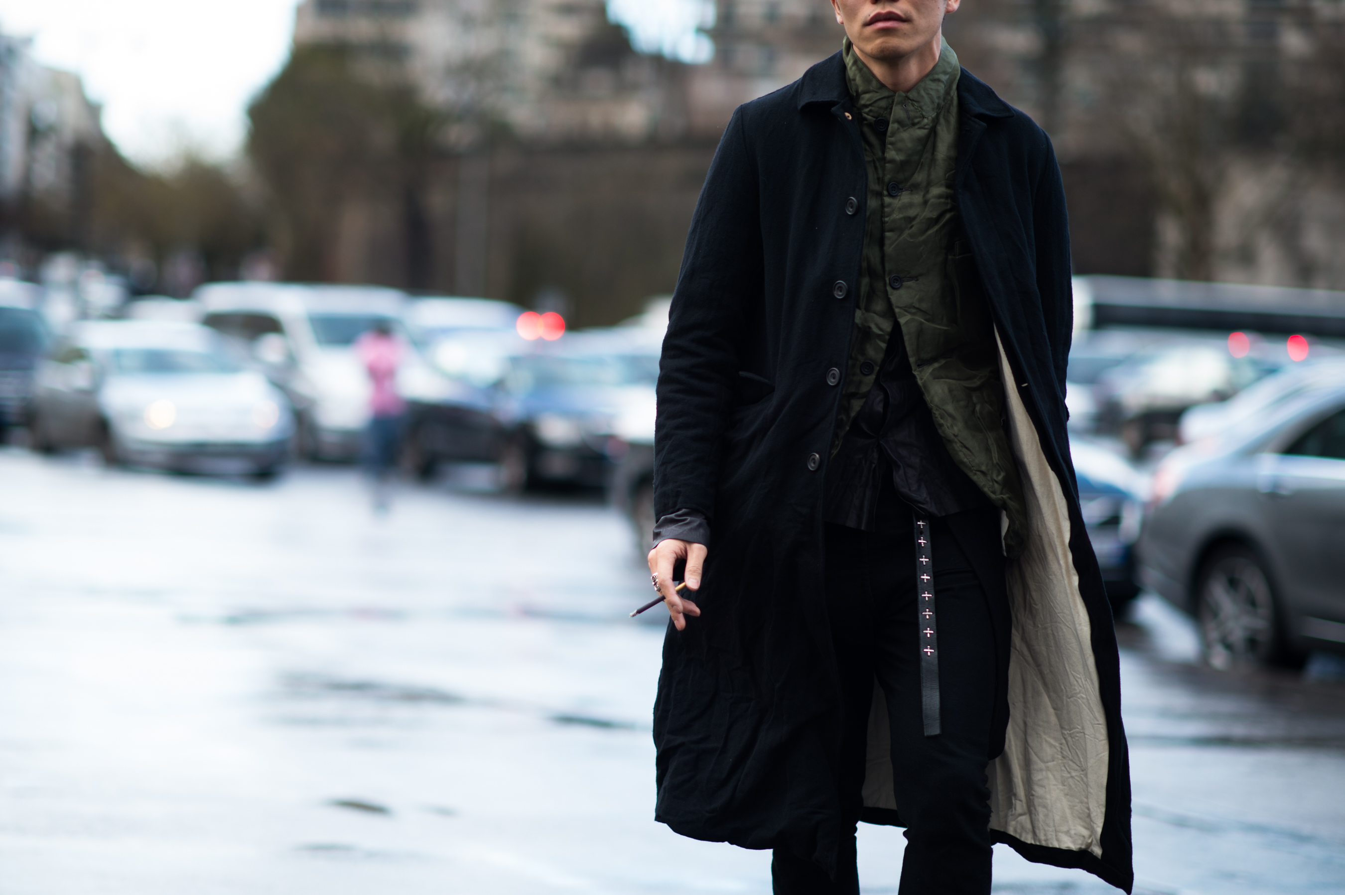 Man wearing vest and vintage coat
