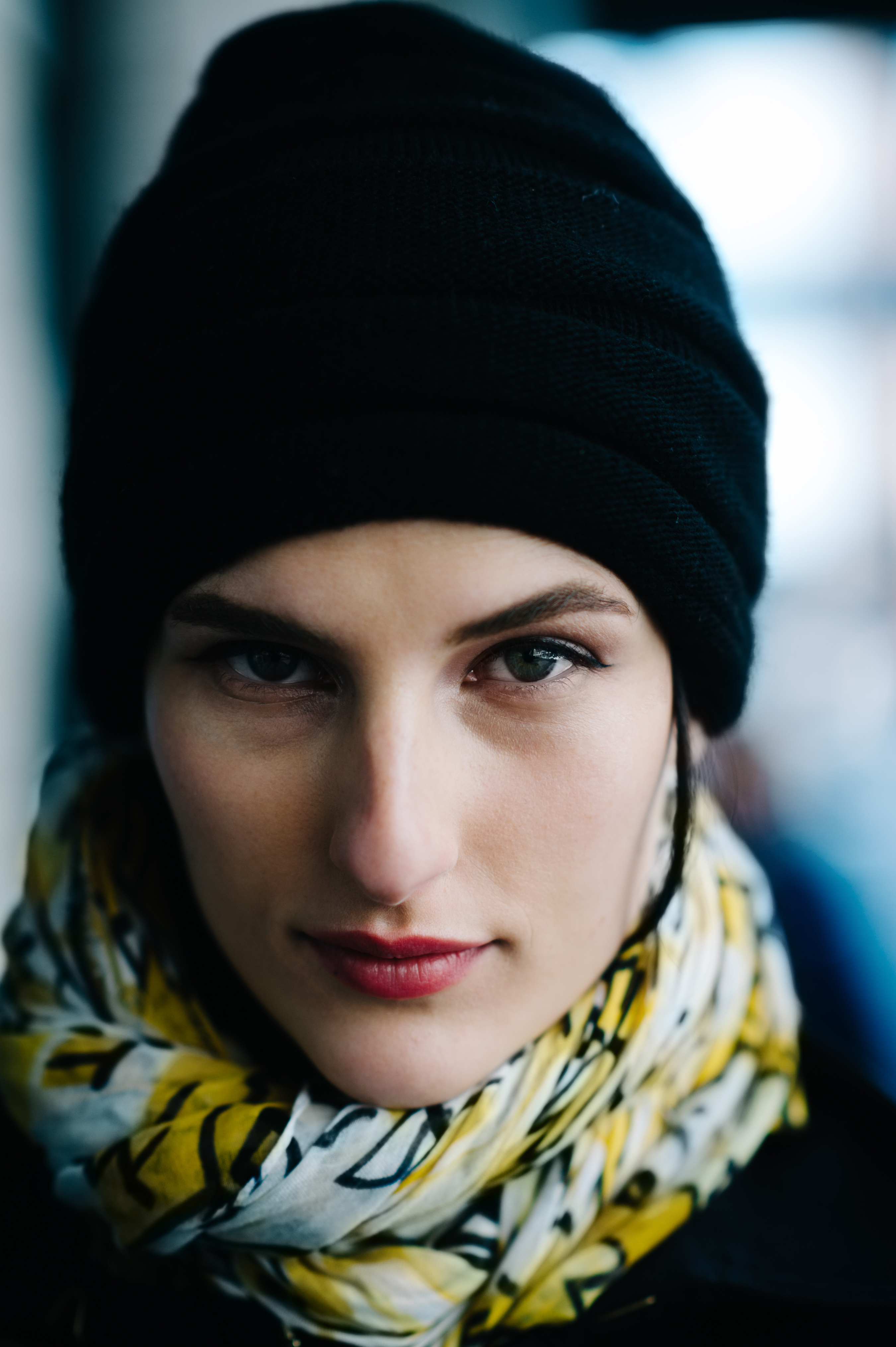 Portrait of a girl wearing black hat