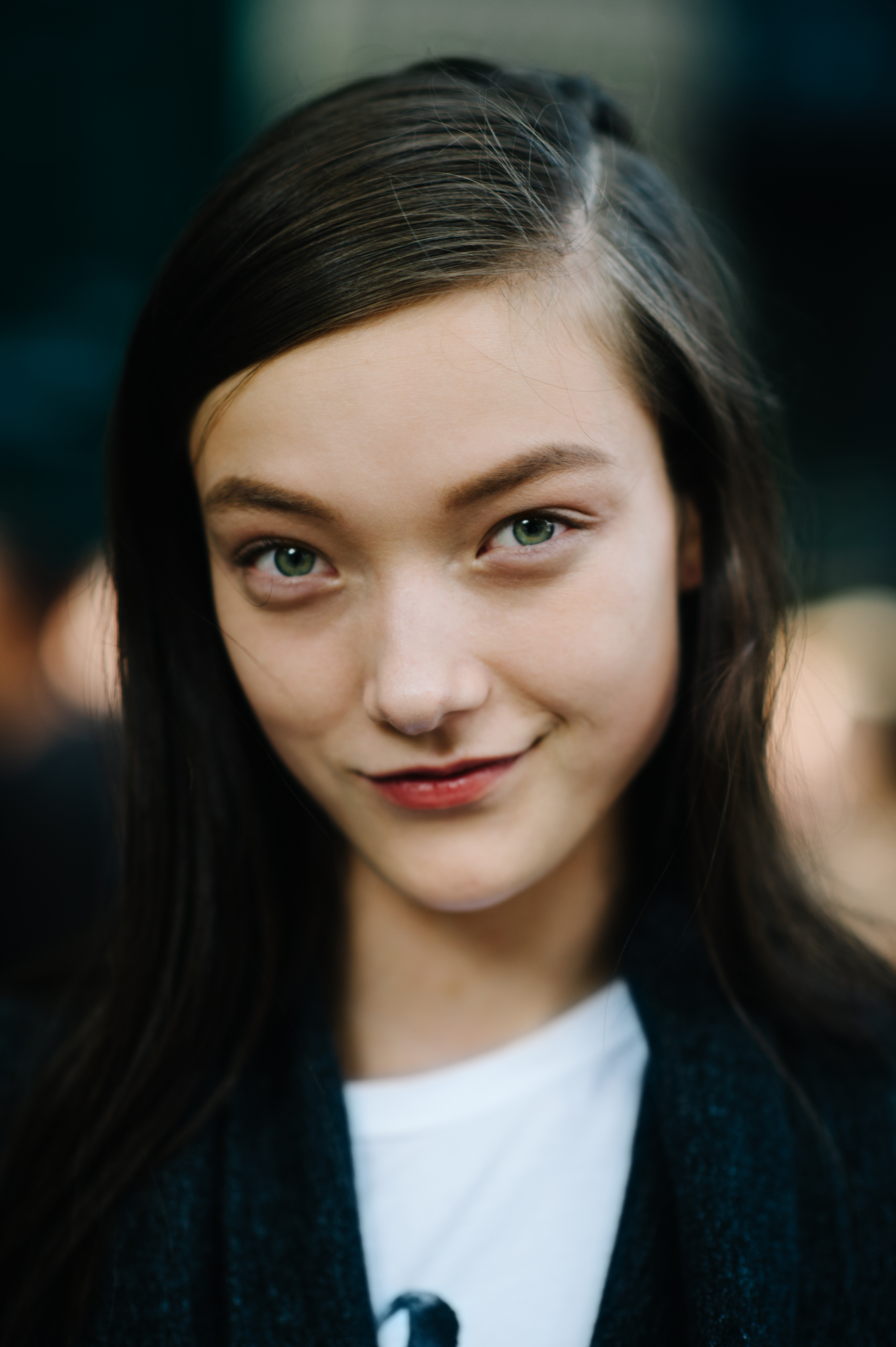 Model with green eyes after Jil Sander show