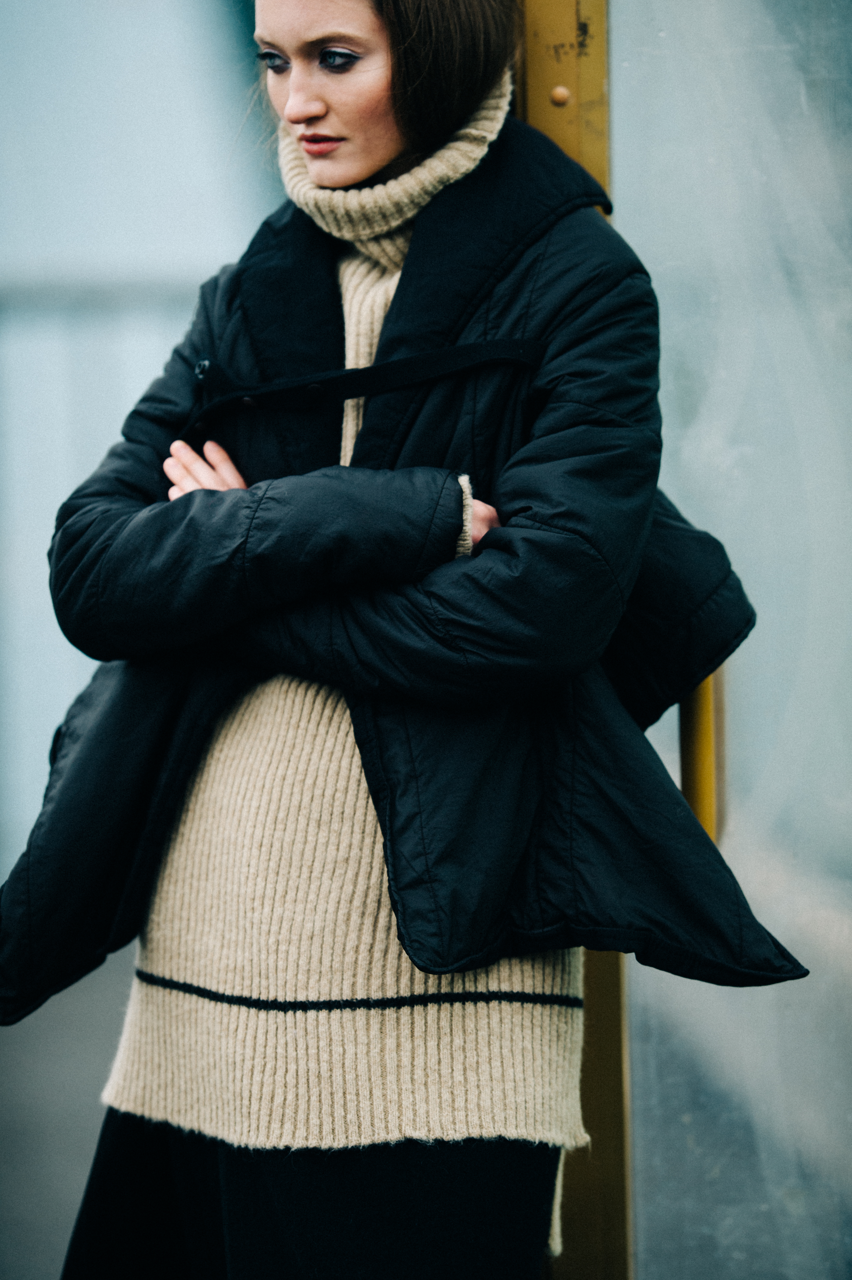 Model wearing beige sweater