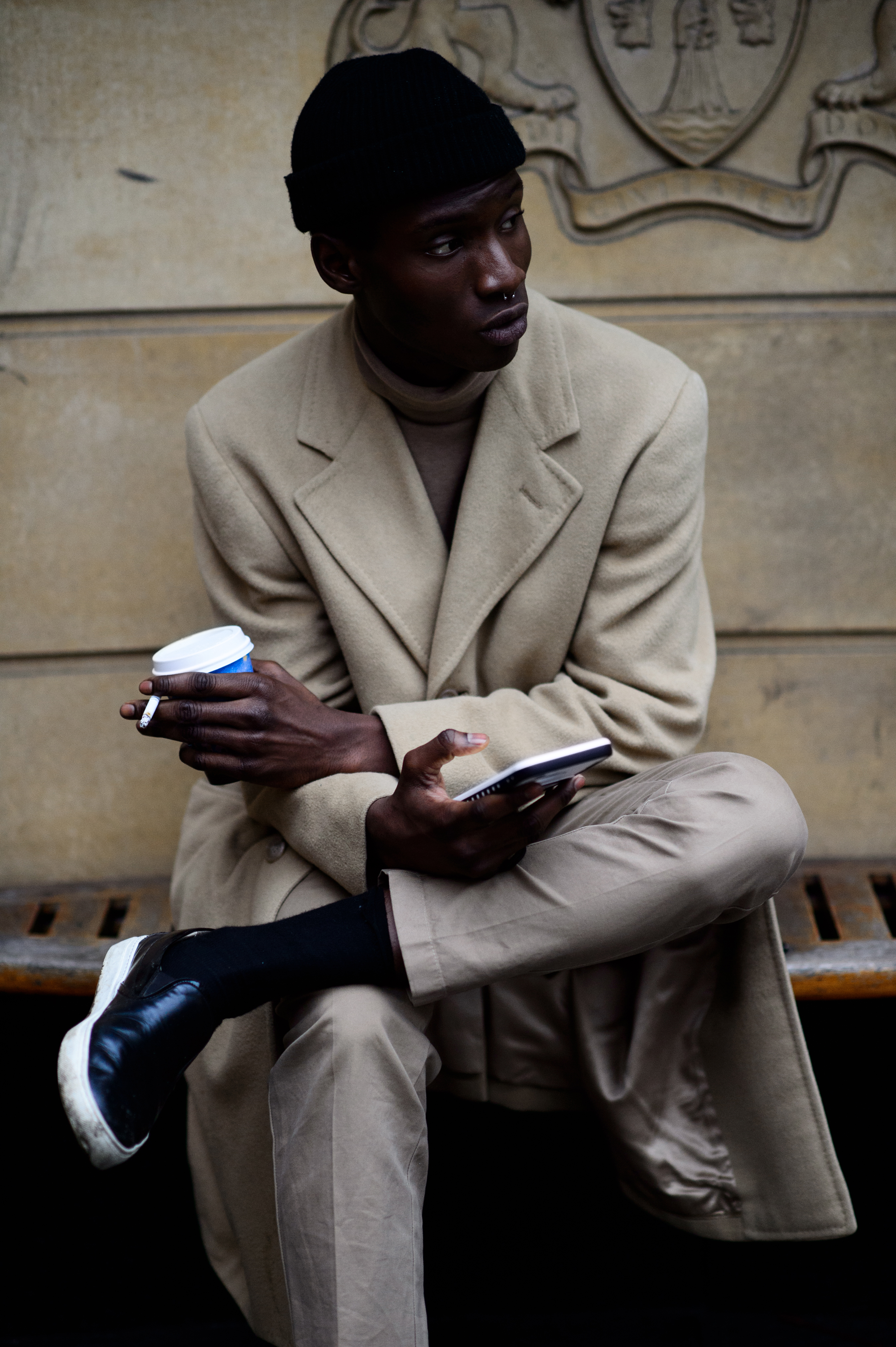 Male model wearing beige outfit