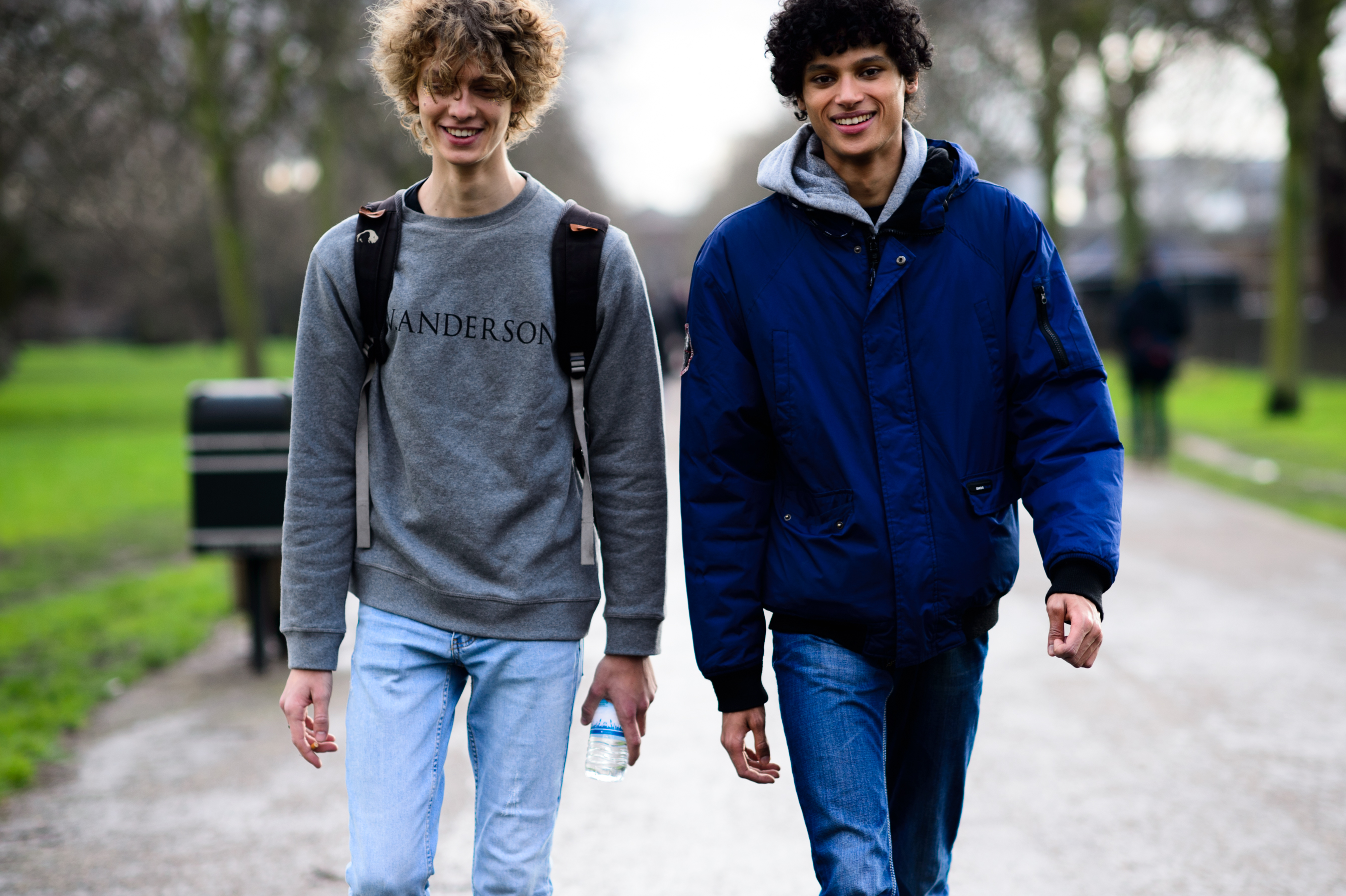 Two male models after the show