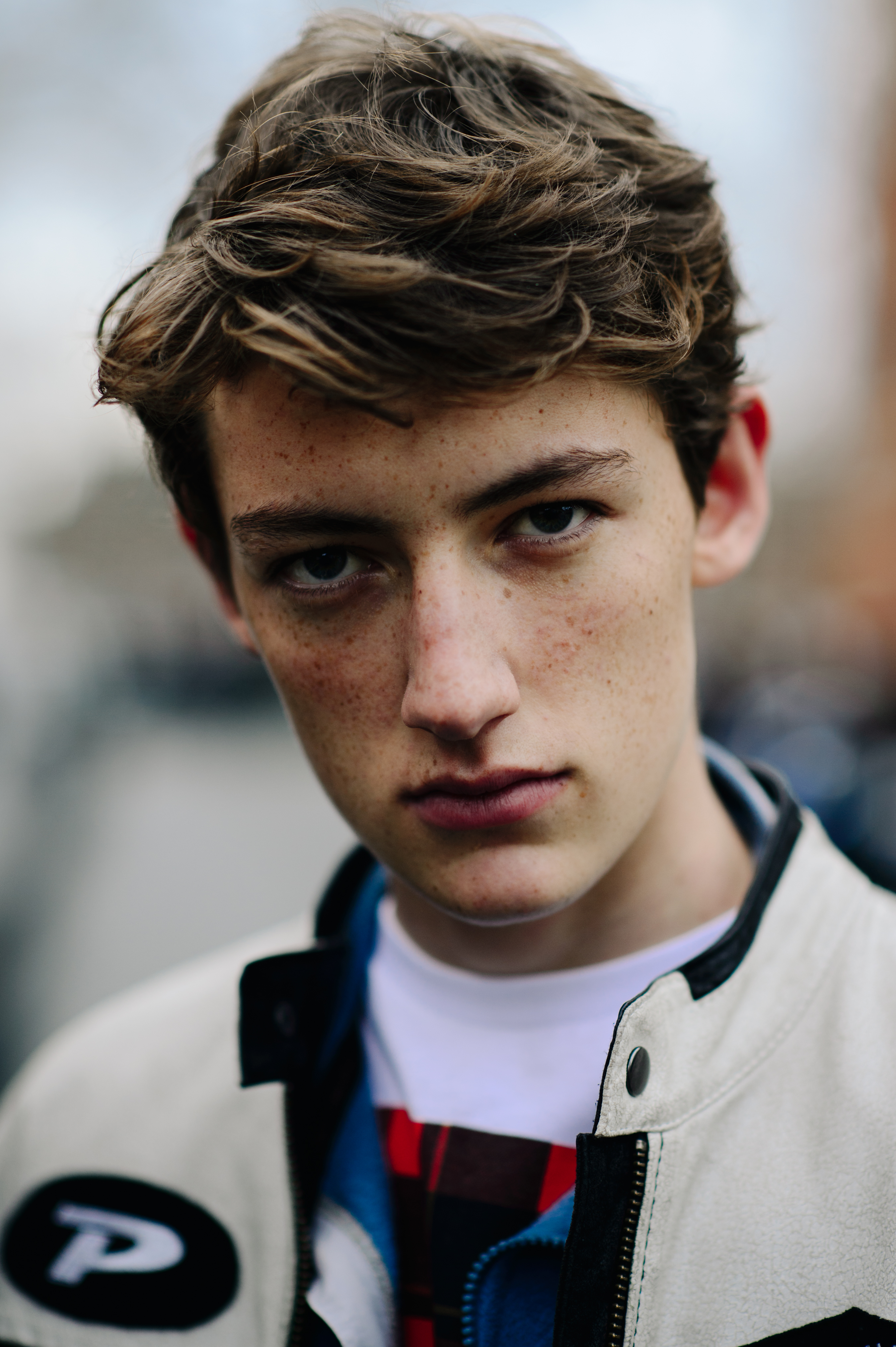 Portrait of a male model with freckles