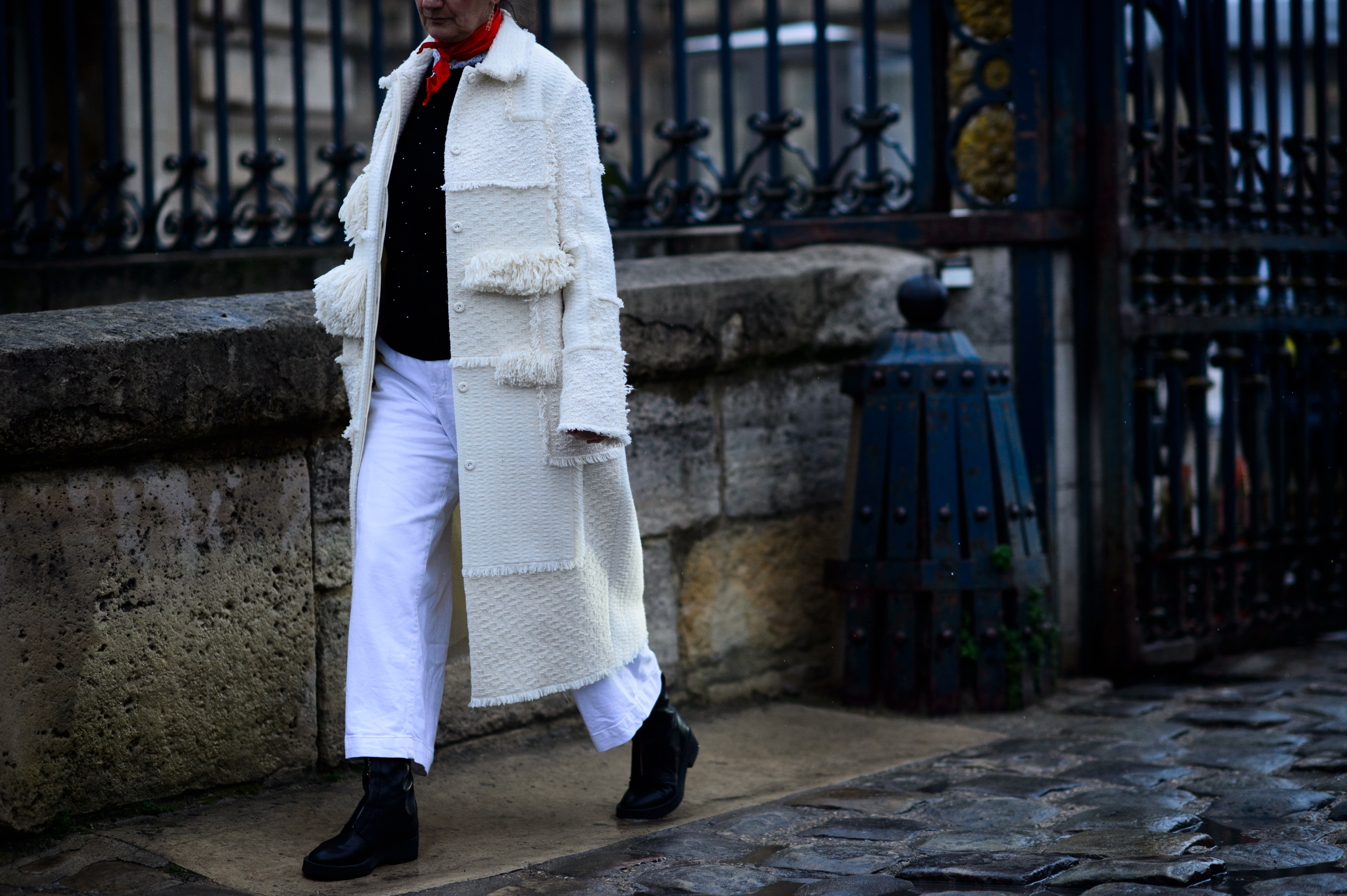 Woman wearing white coat