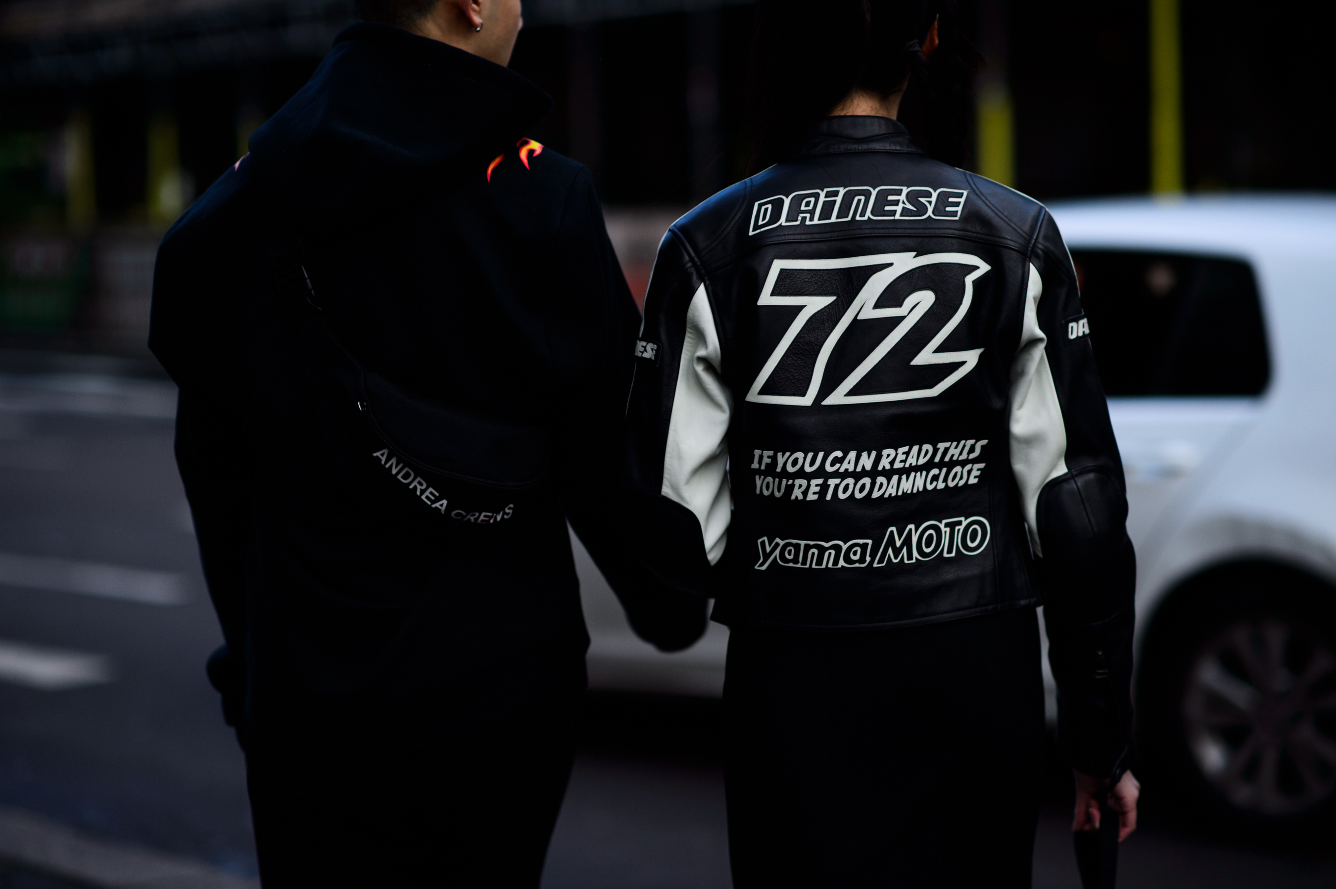Man and woman wearing black