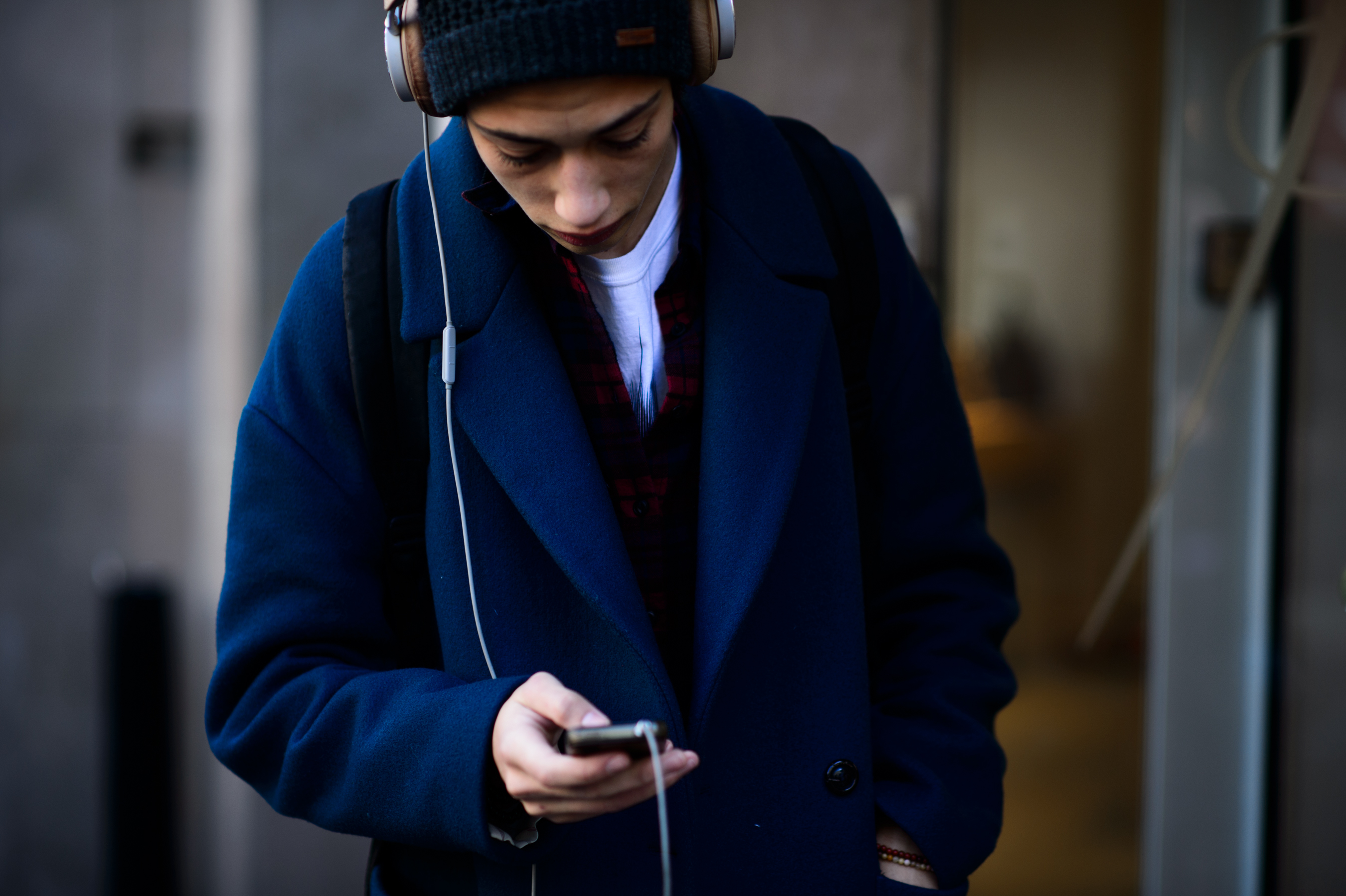 Male model wearing blue coat