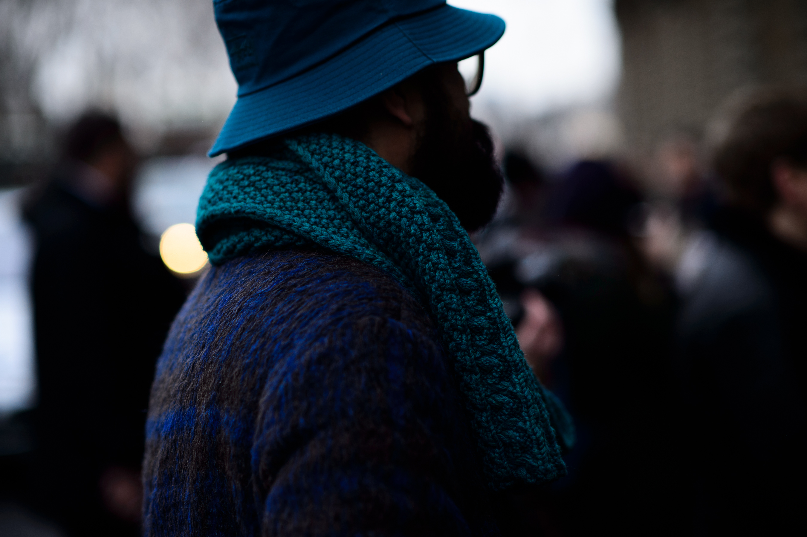 Man wearing bucket hat scarf