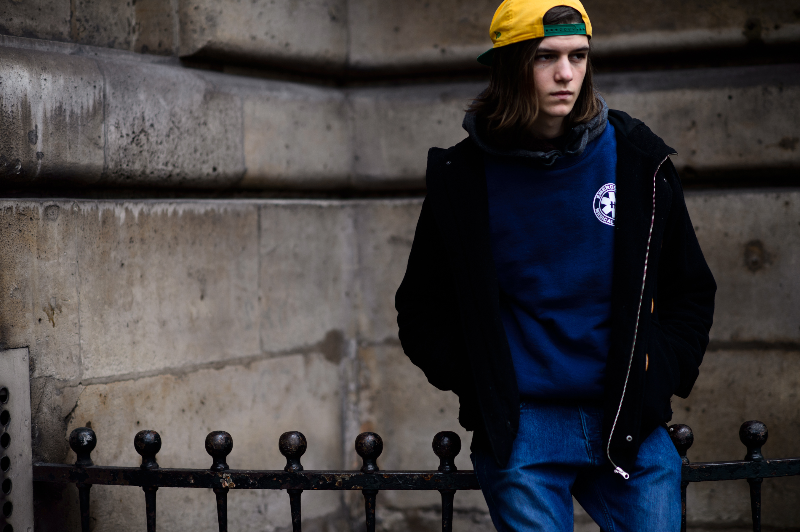 Male model wearing yellow and blue