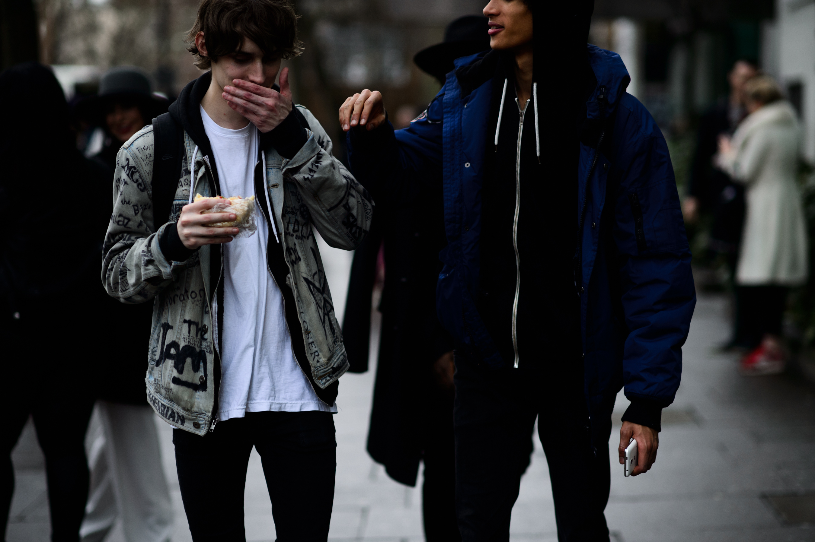 Two male models after show