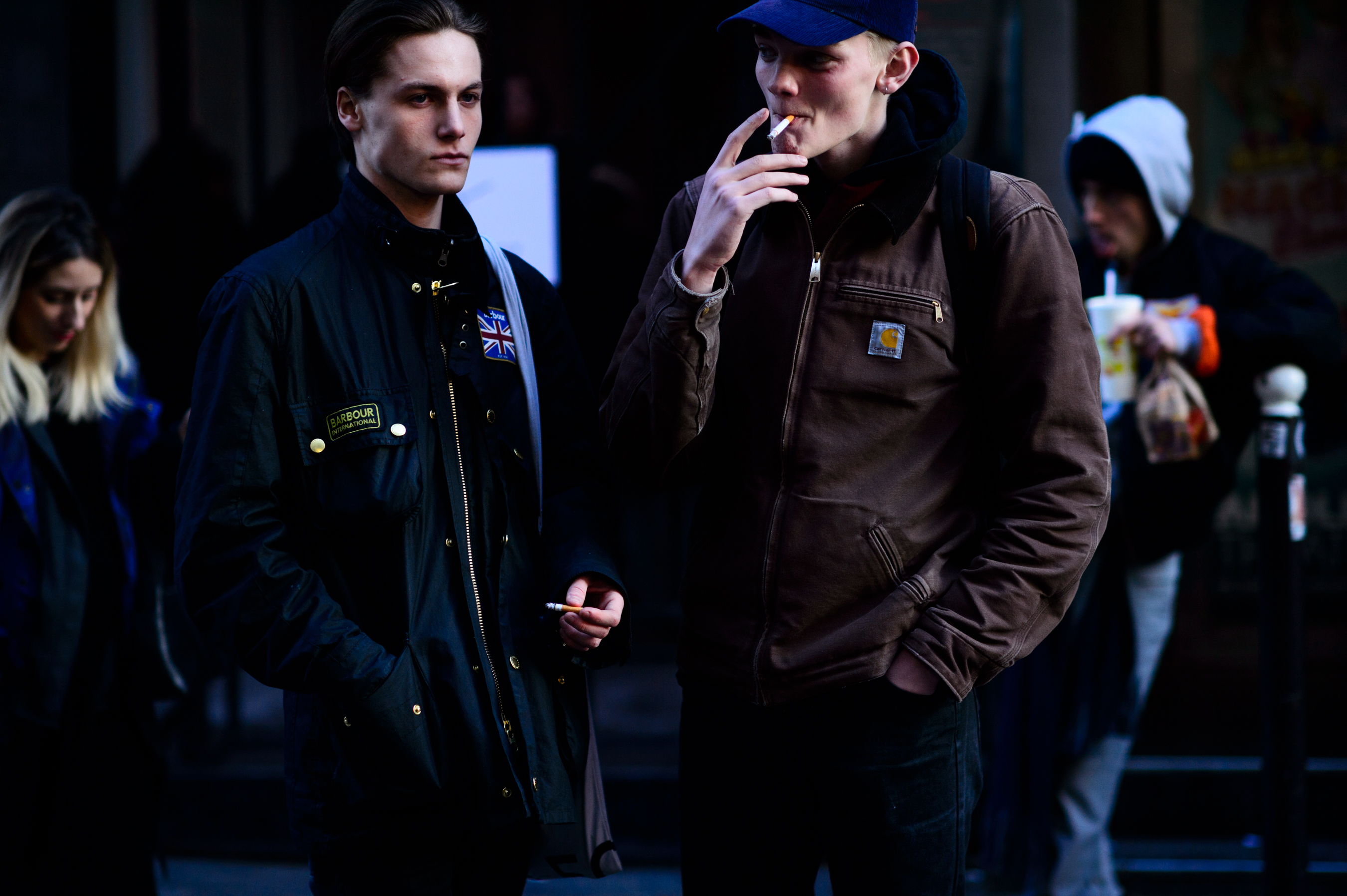Two male models after the show