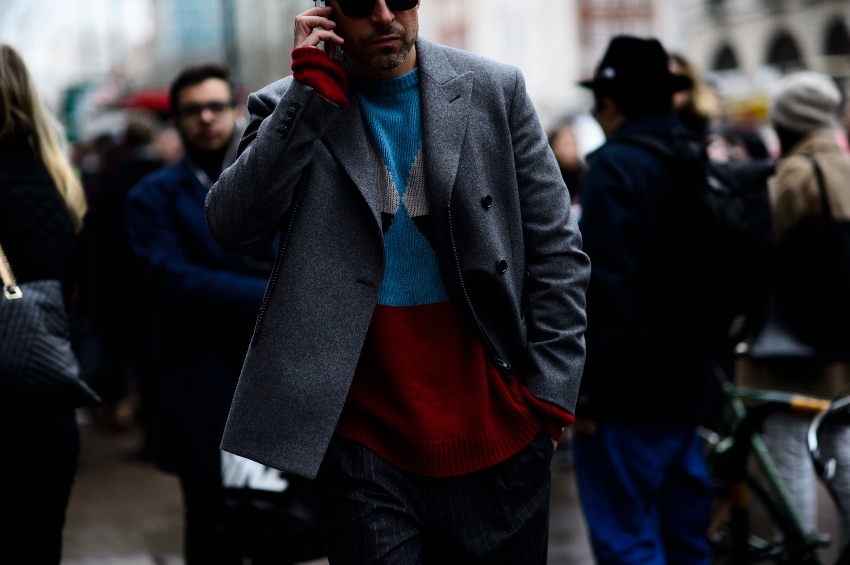 Man wearing sweater and blazer