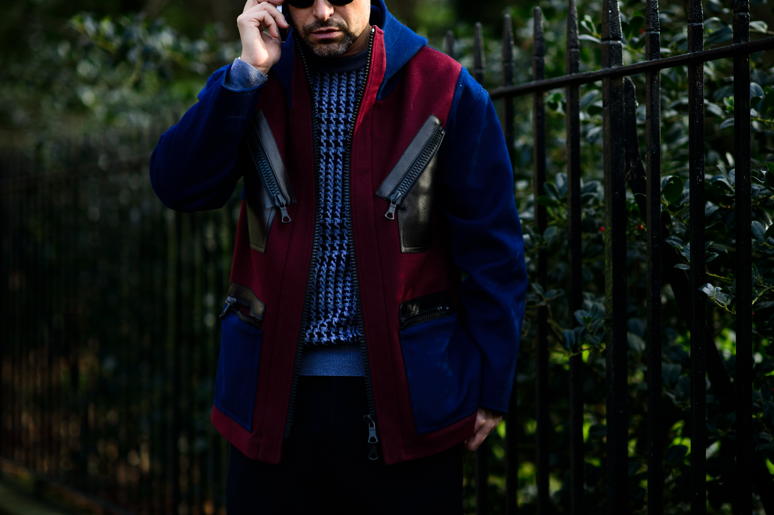 Man wearing blue and red jacket