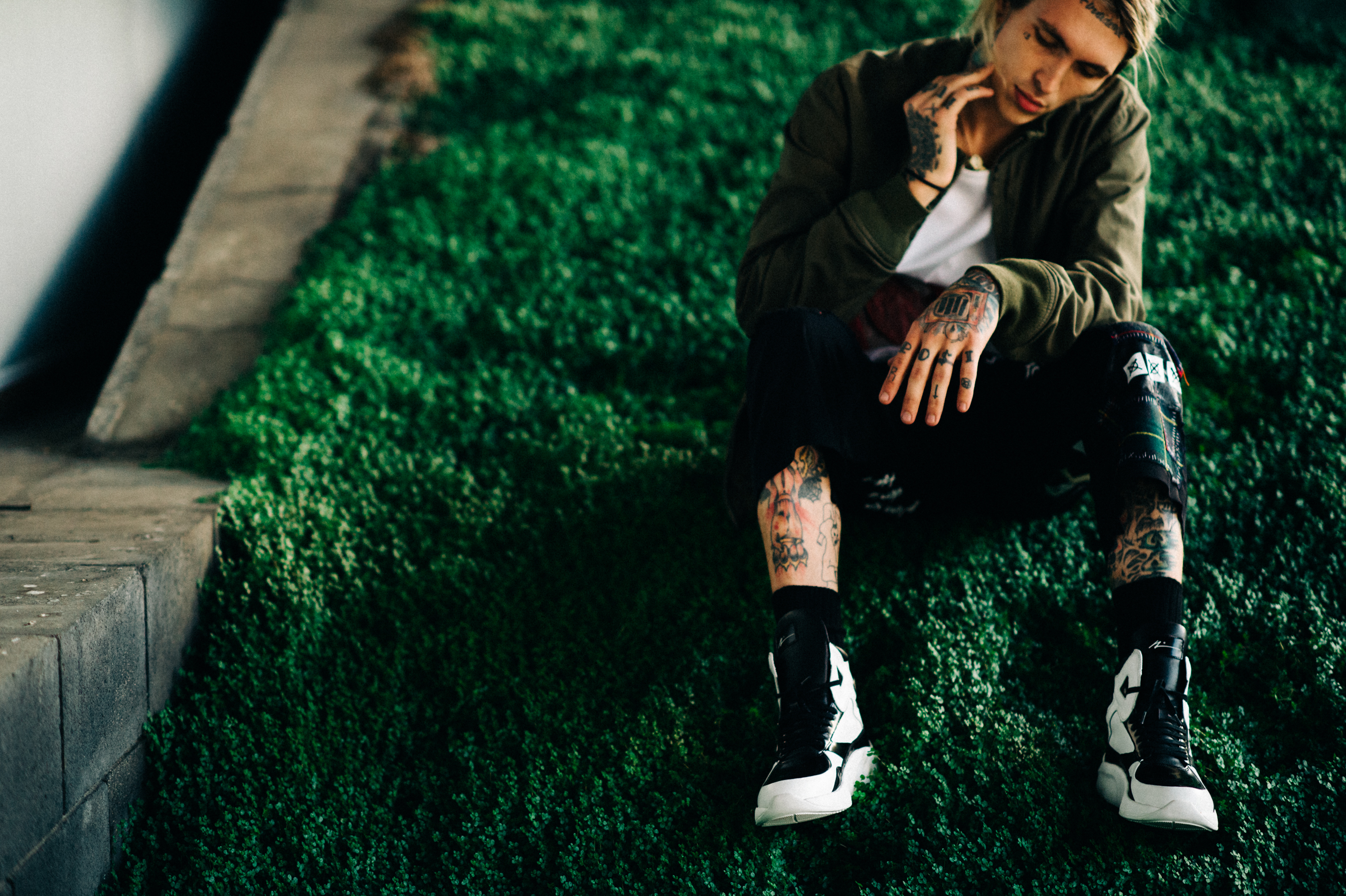 Male model with tattoos posing