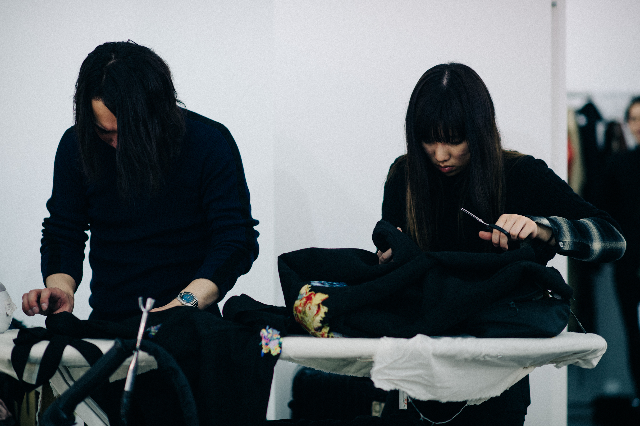 Staff ironing clothes