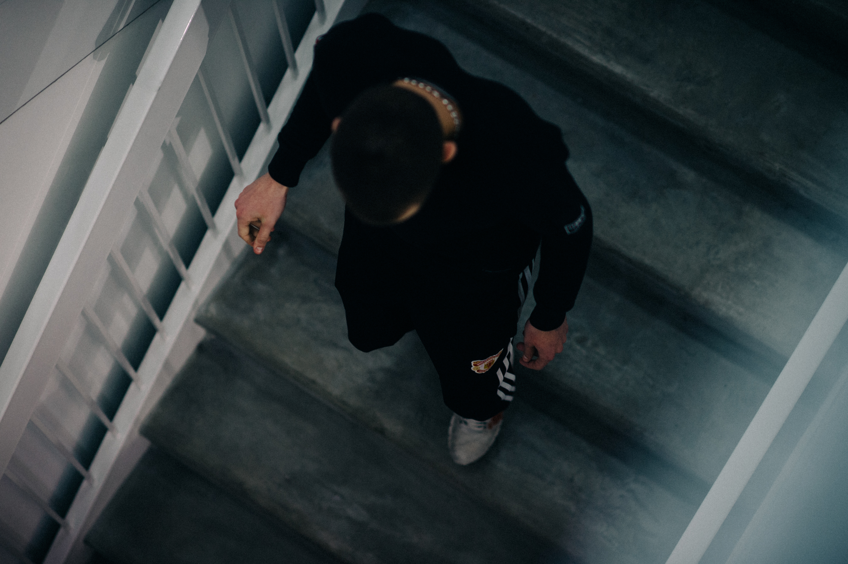 Male model going down the stairs
