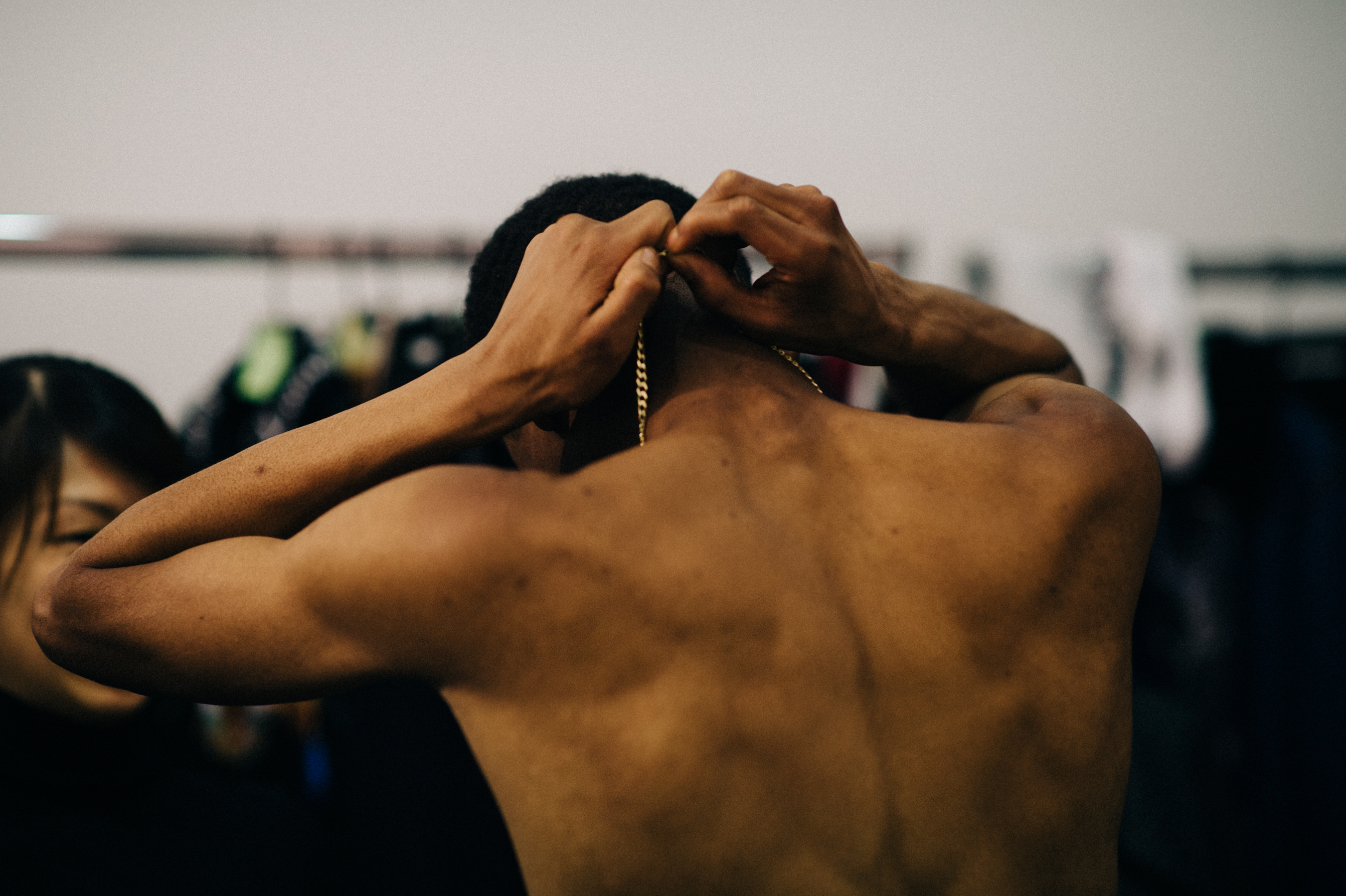Male model taking off chain